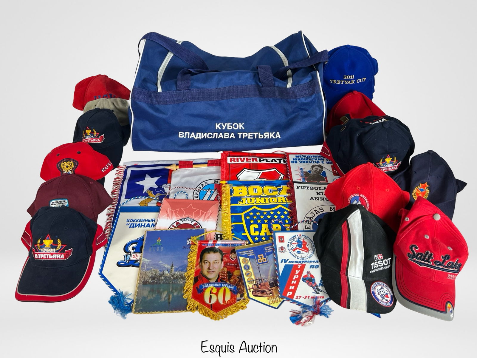 Vladislav Tretiak Hockey Memorabilia- Hats, Bag: Lot of Hockey Memorabilia including Pennants, Hats and Duffle Bag. Mostly related to Vladislav Tretiak or Russian Tournament and Teams. All are in good condition.