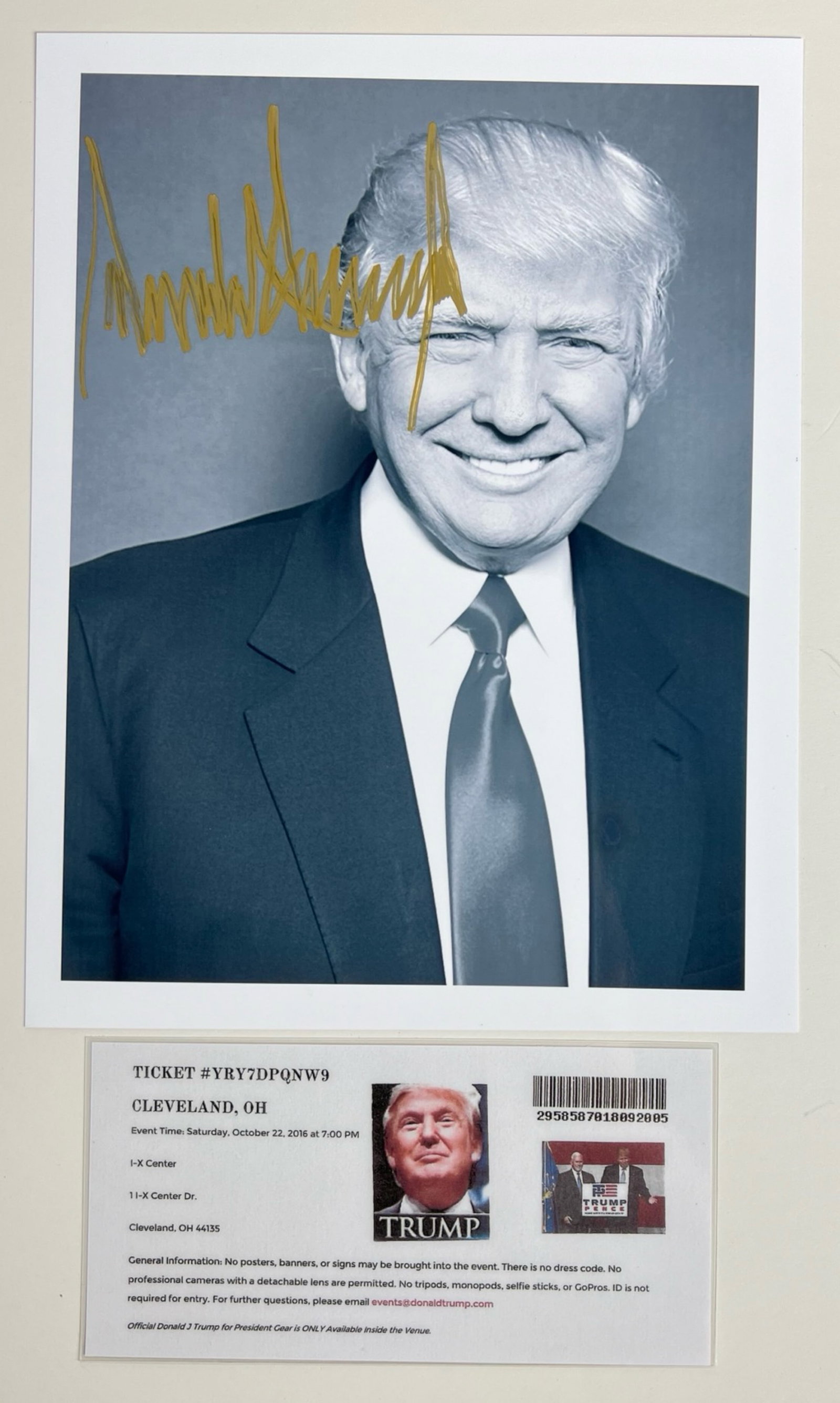 President Donald Trump Signed Photo with Ticket: Capture a moment in political history with this Donald Trump Signed/Autographed Print Out Photograph, signed in Cleveland, OH during 2016 Campaign Event. This unique piece of memorabilia comes with th
