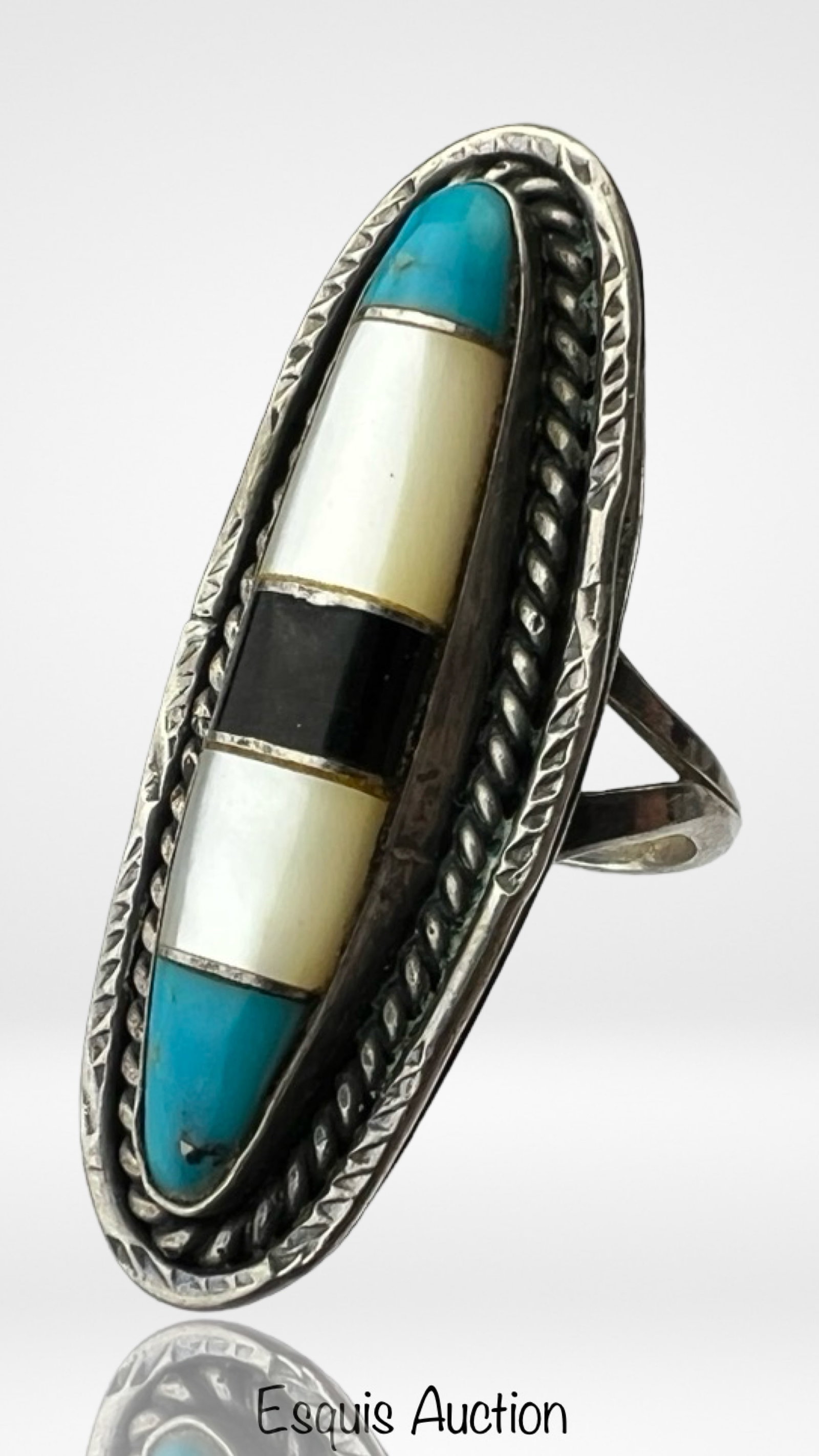 Vintage Zuni Sterling Silver MoP & Turquoise Ring: Vintage Zuni Sterling Silver Rig inlaid with Mother of Pearl, Black Onyx and Turquoise. Size- 6 3/4. Good Condition.