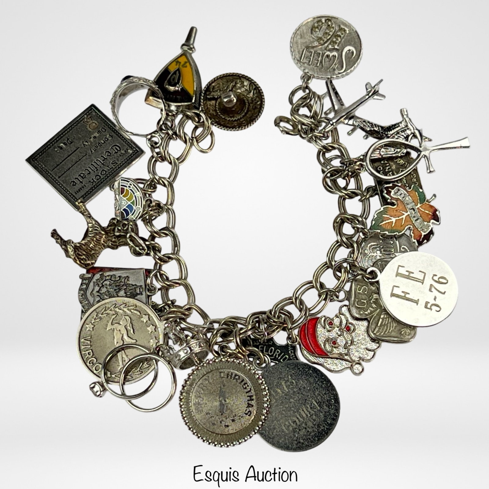 1960's Sterling Silver Charm Bracelet w/ 24 Charms: 1960's-1970's Vintage Sterling Silver Bracelet with 24 mostly Sterling Charms. Good Condition.