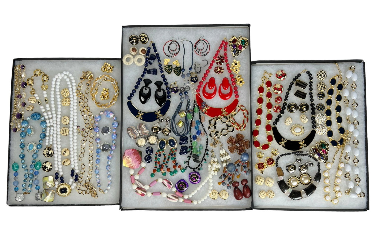 Assortment of Costume Jewelry: Elevate your style with this dazzling Assortment of Costume Jewelry. Bursting with variety, this collection features an array of necklaces, earrings, bracelets, and more, each piece designed to add a 