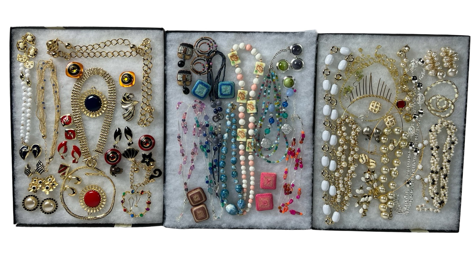 Assortment of Costume Jewelry: Elevate your style with this dazzling Assortment of Costume Jewelry. Bursting with variety, this collection features an array of necklaces, earrings, bracelets, and more, each piece designed to add a 
