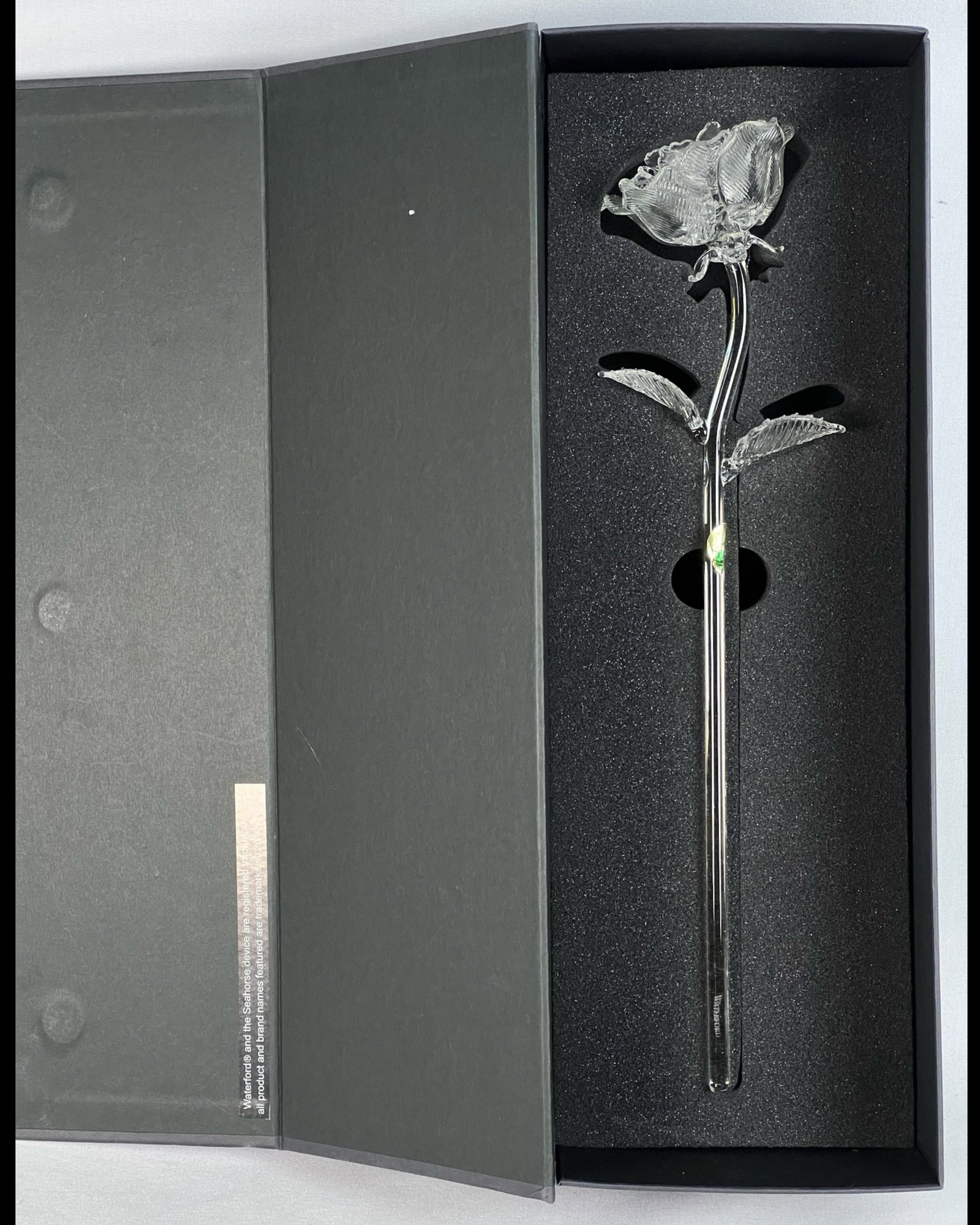 Waterford Fleurology Rose Flower Crystal Sculpture: This Waterford Fleurology Rose Flower Crystal Sculpture exemplifies the fine artistry and elegance of Waterford's crystal works. It makes a stunning decorative piece, ideal for gifting or as a sophist