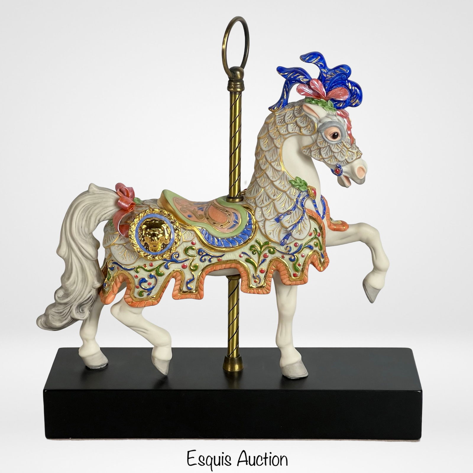 Cybis "Charger" LE Bisque Porcelain Carousel Horse: This stunning Cybis "Charger" Bisque Porcelain Carousel Horse is a beautifully crafted piece of art, representing the elegance and charm of traditional carousel horses. This limited edition piece is n