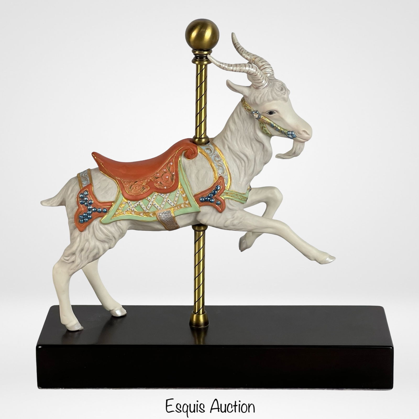 Cybis LE Carousel Goat Bisque Porcelain Figurine: Introducing the delightful Cybis Carousel Goat Bisque Porcelain Figurine, a limited edition piece that showcases the whimsical charm and artistic excellence of Cybis creations. This figurine is number