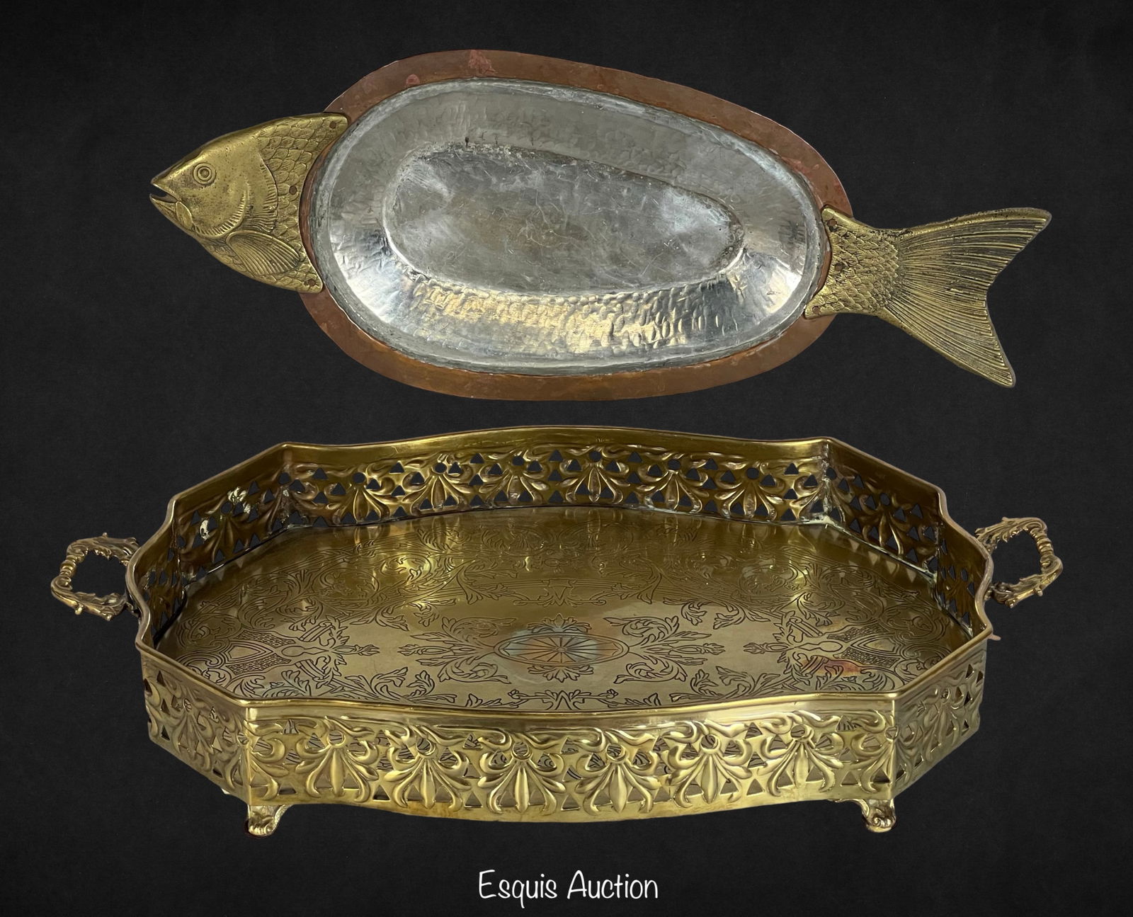 olid Castilian Brass Serving Tray & Fish Platter: The set includes a solid Castilian brass serving tray with ornate handles and intricate designs, and a unique fish-shaped platter made of brass and hammered copper. Both pieces exhibit fine craftsmans