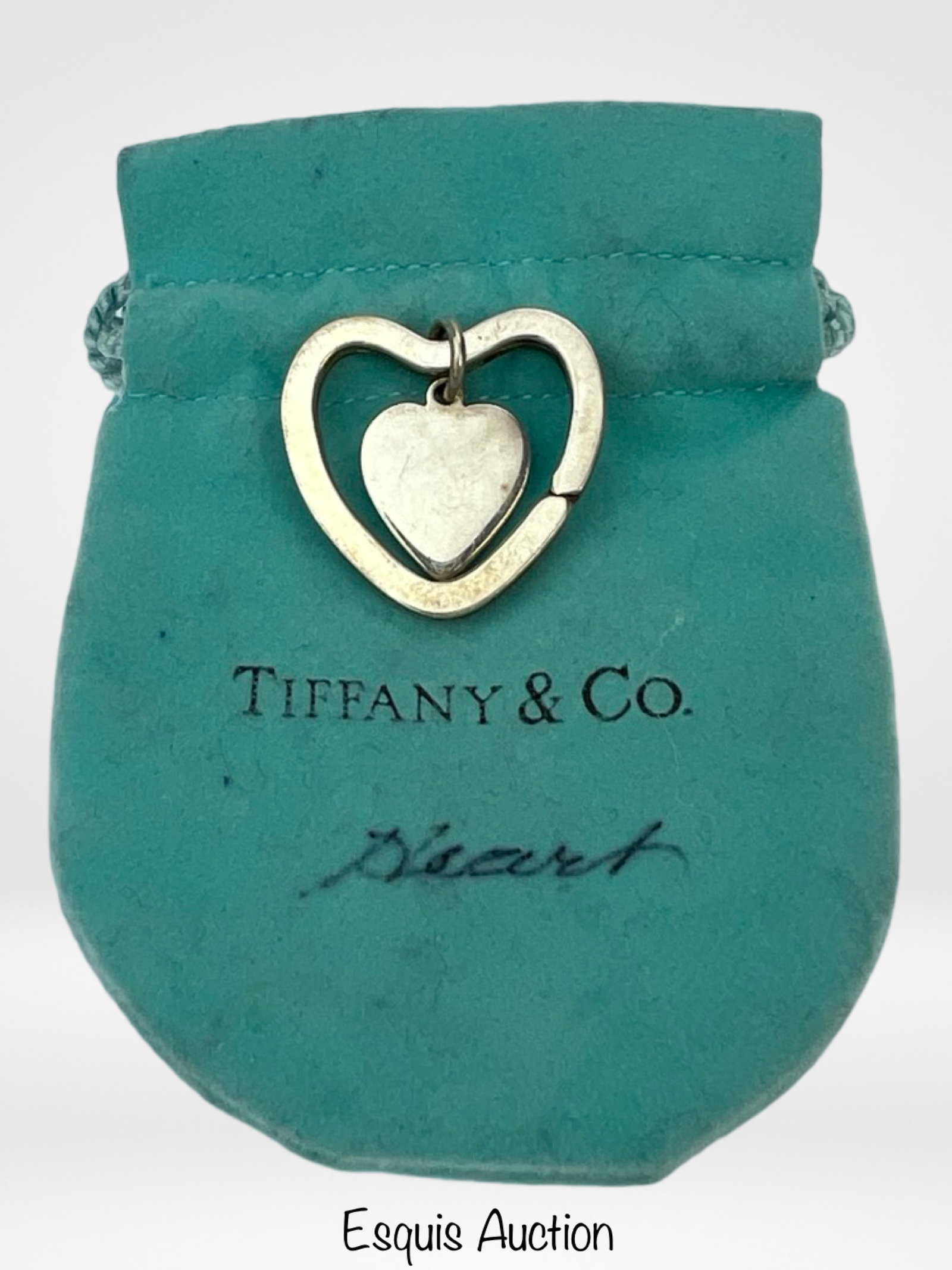 Tiffany & Co. Sterling Silver Heart Charm Key Ring: Tiffany & Co. Sterling Silver Heart Charm Key Ring. Good overall condition.