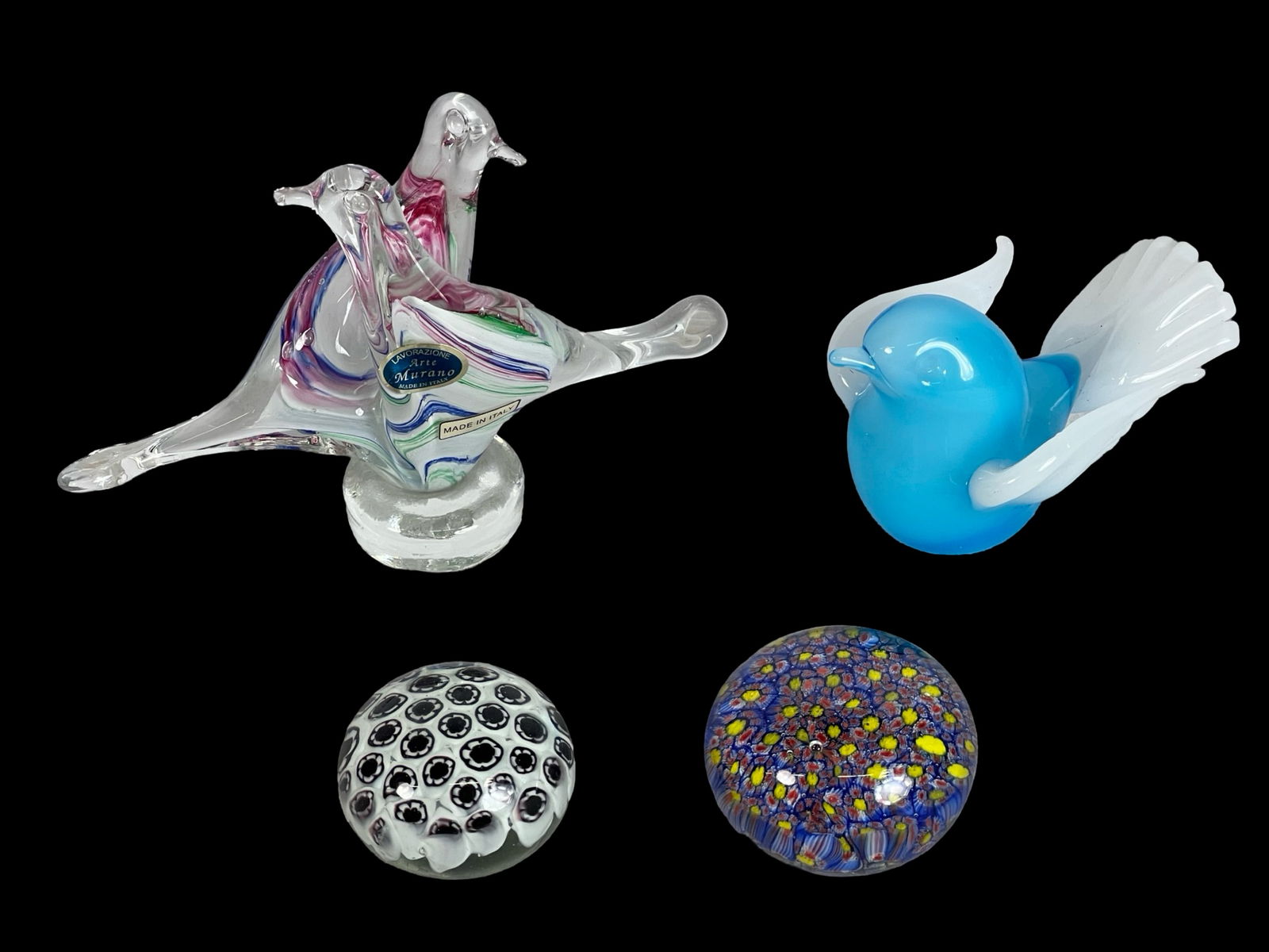 Muarno Art Glass Bird Figures & Paperweights: This lot features an exquisite collection of art glass items, including two beautiful Murano bird figures and two vibrant paperweights. Tallest bird is 5", paperweights are 2 1/2" in dia. All are in g