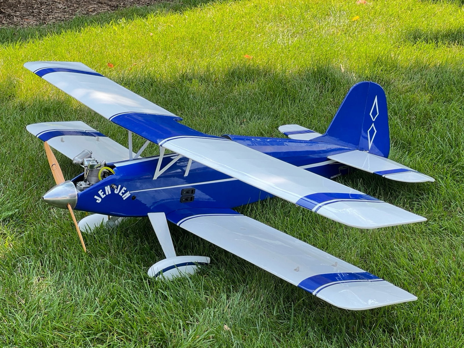 Alien Aircraft Arrow Master 55 RC Airplane w Saito: Alien Aircraft Arrow Master 55. This is a kit built biplane named "Jen Jen", with blue and white custom Ultracote covering. Features a Saito FG 14c gasoline 4 stroke engine, engine kill switch, chargi