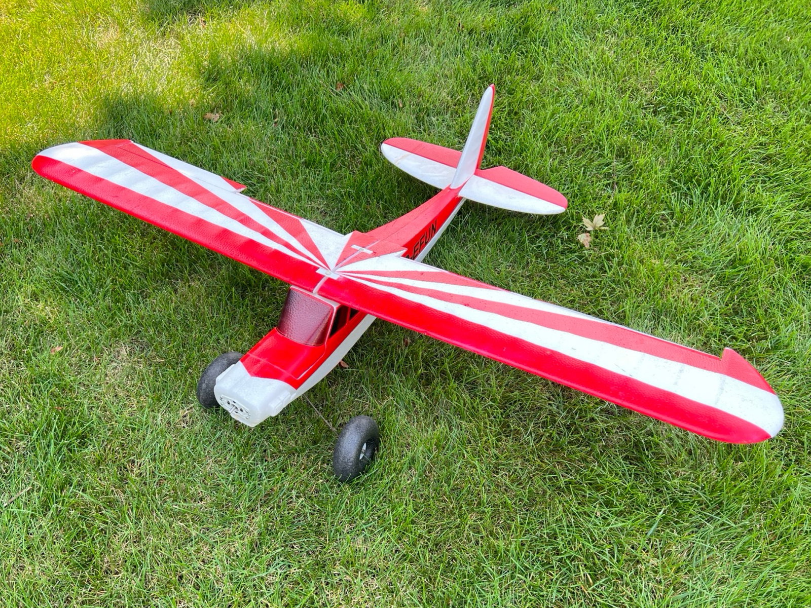 Multiplex Fun Cub RC Airplane: Multiplex Fun Cub. This easy flyer is an all foam white and red electric plane. Includes motor, receiver and ESC.41" x 55"