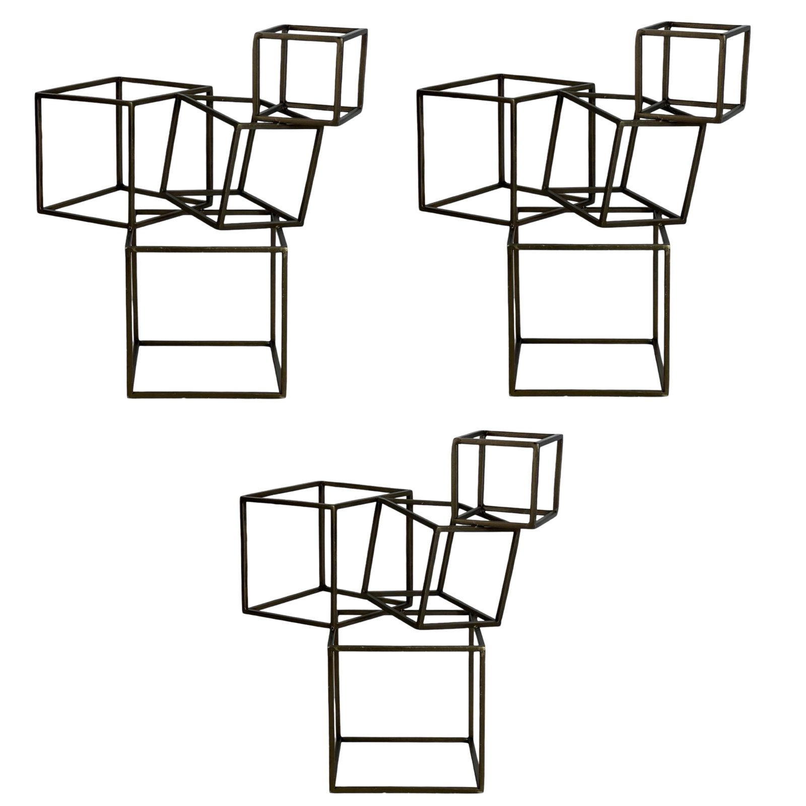 Trio of Modernist Metal Open Cube Sculptures: This striking trio of Modernist metal open cube sculptures embodies the essence of minimalist design with a contemporary twist. Each sculpture stands 16 inches tall, and the set features three interco