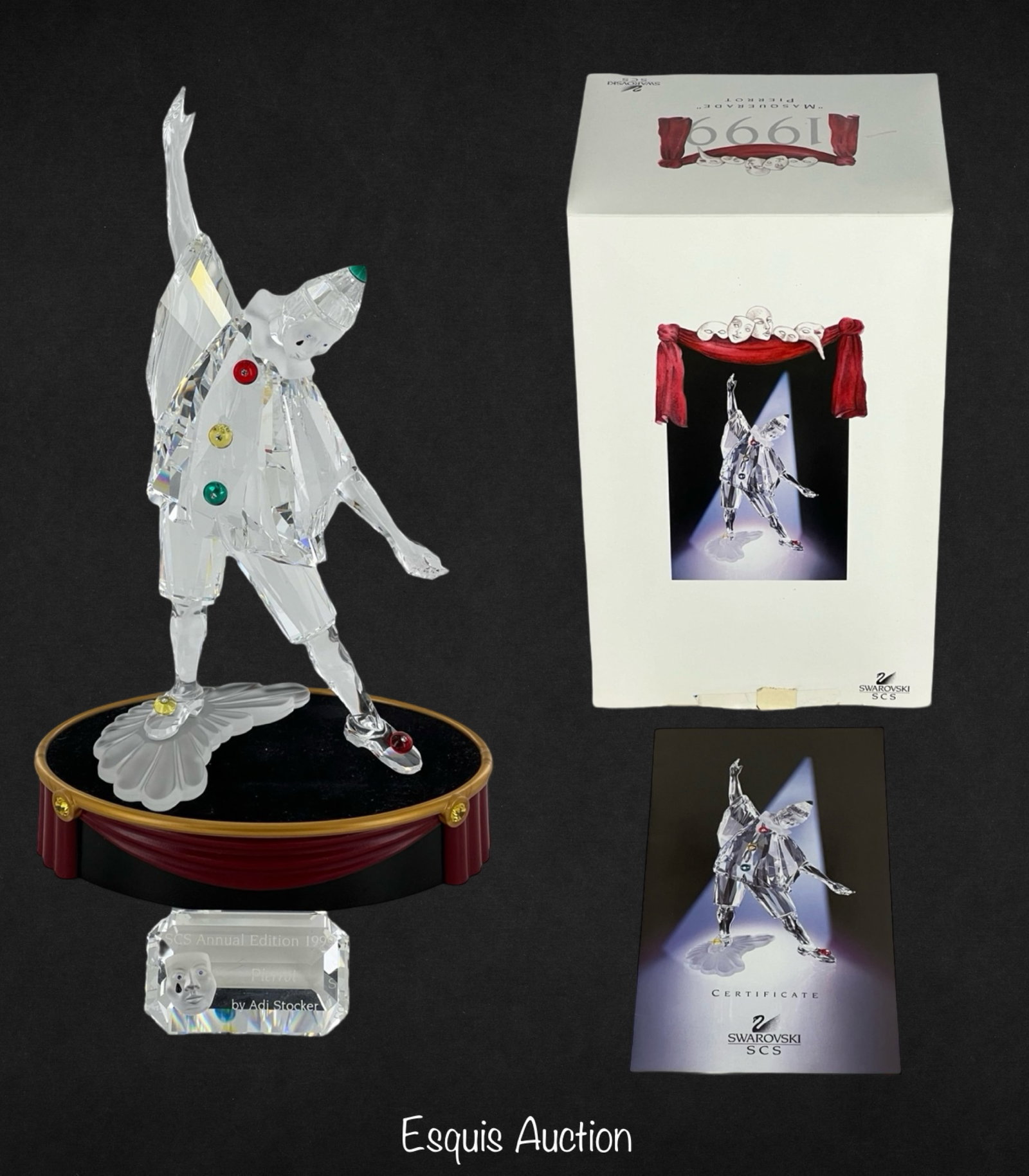 Swarovski SCS 1999 Pierrot Crystal Figurine: The Swarovski SCS 1999 Annual Edition Pierrot figurine is a dazzling piece designed by Adi Stocker. Standing 8 inches tall, this crystal figurine depicts Pierrot, the iconic figure from French pantomi