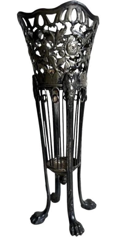 Antique Art Nouveau Footed Vase Holder by WMF: This exquisite antique vase holder exemplifies the Art Nouveau style, characterized by its elegant, flowing lines and intricate floral patterns. Crafted by the renowned German manufacturer WMF (W?rtte