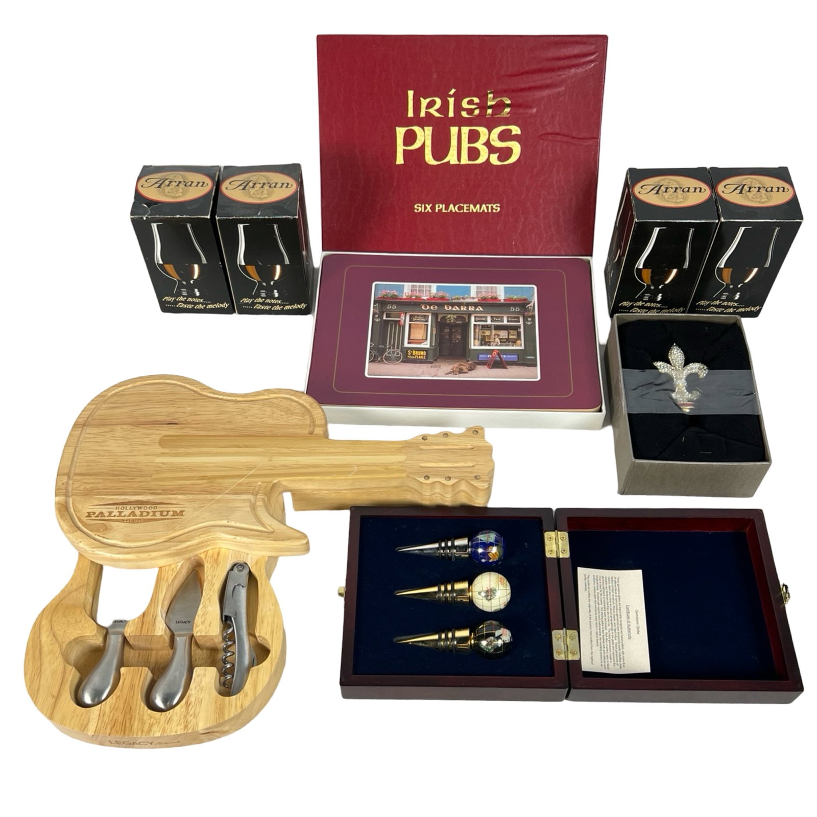 Collection of Entertaining Home Bar Accessories: This curated collection includes an assortment of entertaining accessories perfect for enhancing any bar or gathering space. Featured in this lot is a set of six Irish Pub-themed placemats, ideal for 