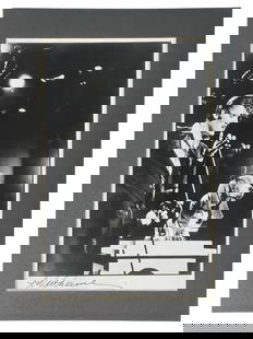 Alfred Wertheimer Signed Elvis Presley Photograph: This lot features an original black and white photograph of the legendary Elvis Presley, captured by the renowned photographer Alfred Wertheimer in 1979. The photograph, measuring 8" x 10", depicts El