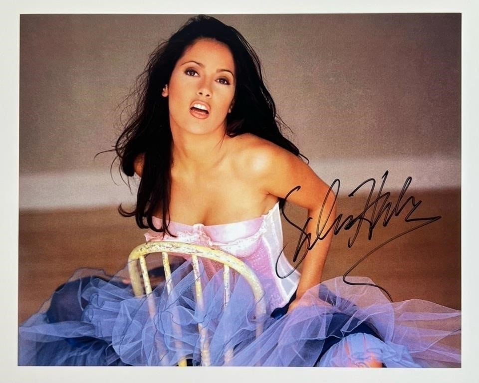 Salma Hayek Autographed/ Signed Sexy Photograph: This captivating collector's item features Autographed vibrant photograph of the renowned actress Salma Hayek. The image showcases Hayek in a glamorous pose, exuding both confidence and elegance.8" x 