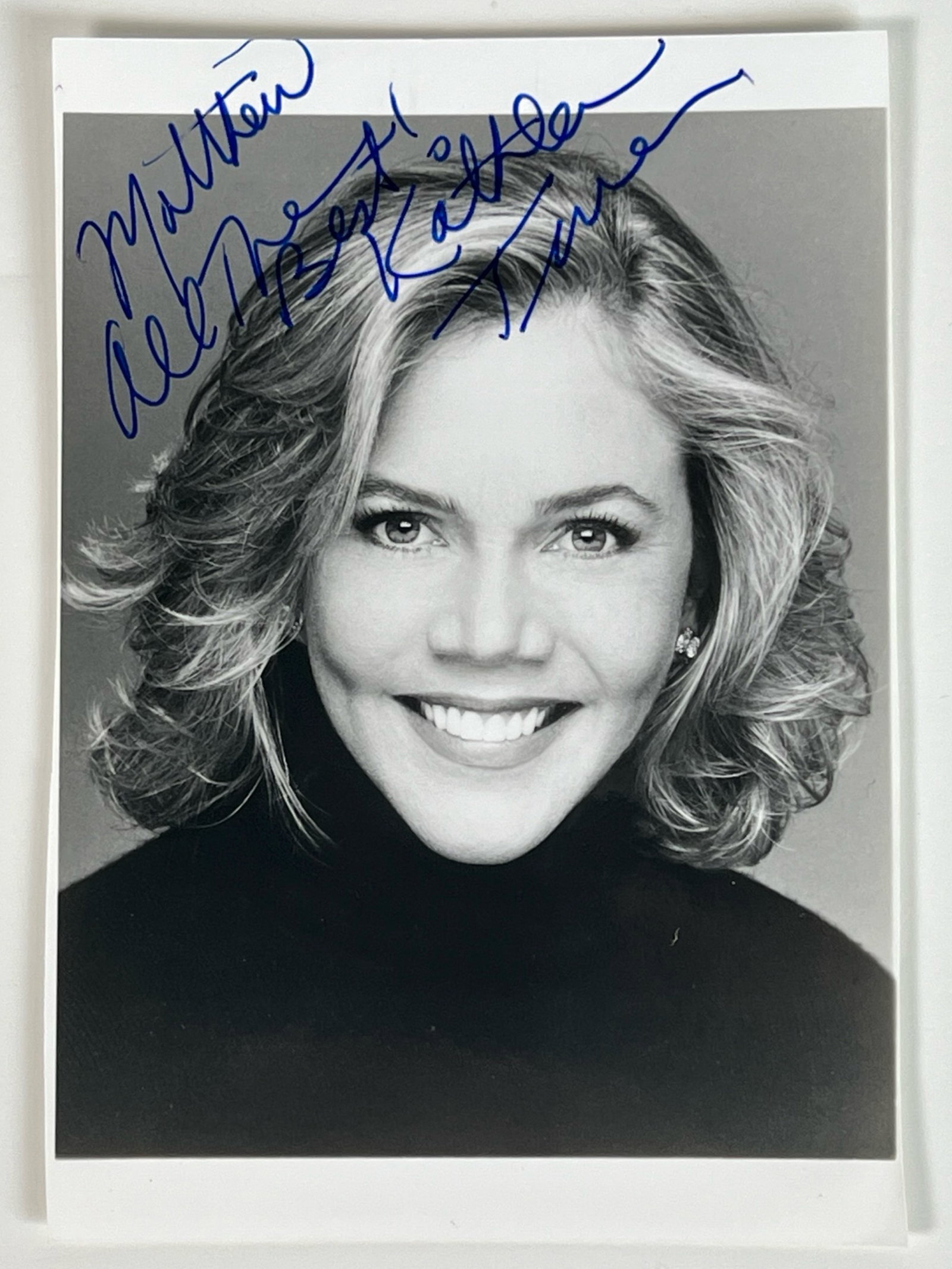 Kathleen Turner Autographed/ Signed Photograph: Kathleen Turner autographed photograph featuring her warm, smiling portrait.5" X 3 1/2". Good Condition. Comes with COA.PLEASE READ BEFORE BIDDING: Esquis Auctions wishes to clarify that we do not emp