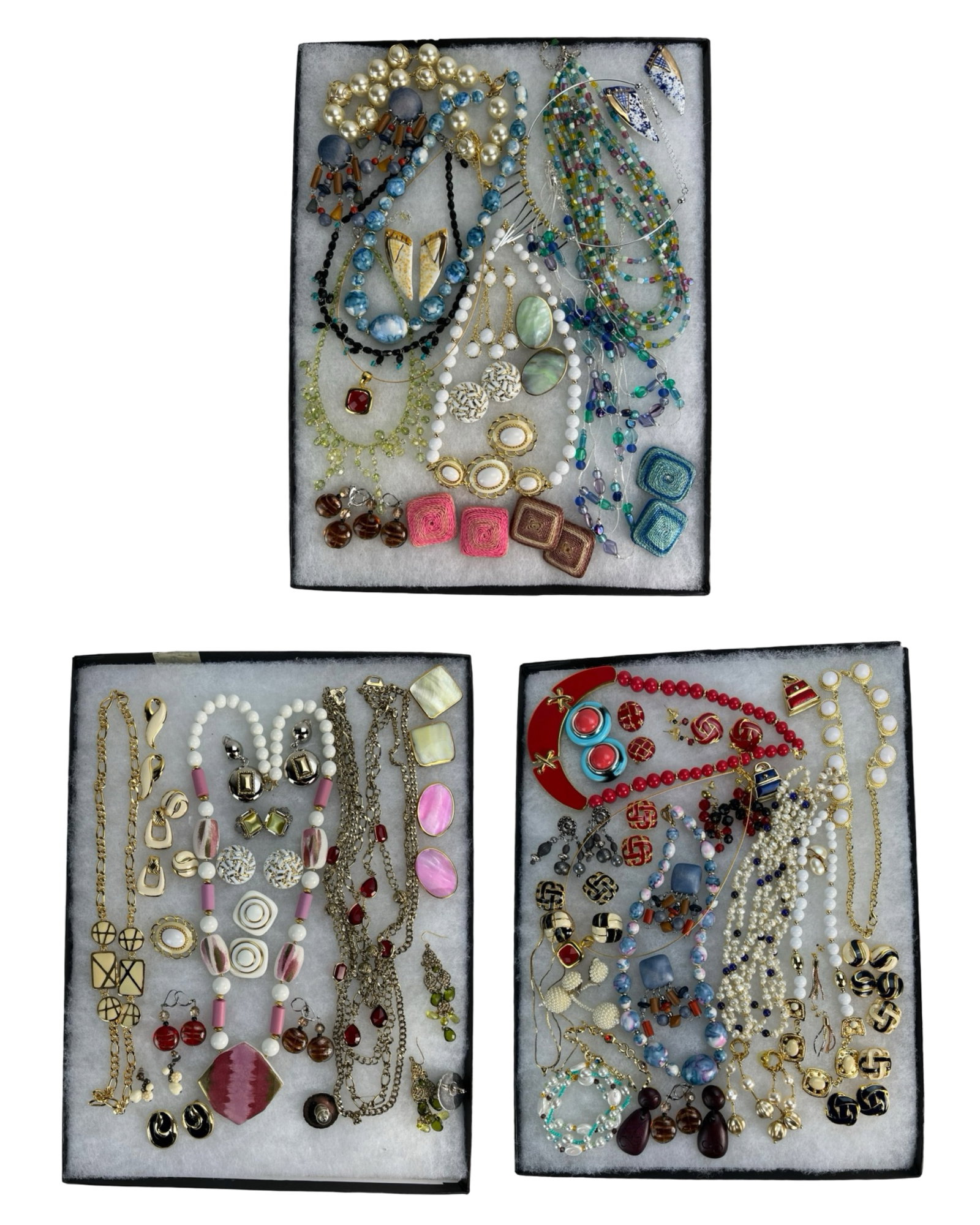 Assortment of Costume Jewelry: Elevate your style with this dazzling Assortment of Costume Jewelry. Bursting with variety, this collection features an array of necklaces, earrings, bracelets, and more, each piece designed to add a 