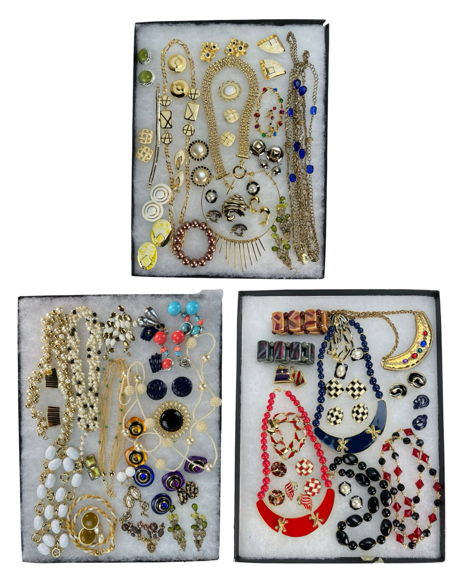 Assortment of Costume Jewelry: Elevate your style with this dazzling Assortment of Costume Jewelry. Bursting with variety, this collection features an array of necklaces, earrings, bracelets, and more, each piece designed to add a 