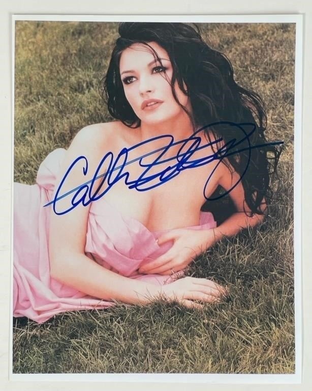Catherine Zeta-Jones Autographed Photograph: Capture the timeless elegance and talent of Catherine Zeta-Jones with this captivating 8" x 10" autographed photograph. Known for her roles in "Chicago," "The Mask of Zorro," and a myriad of other fil