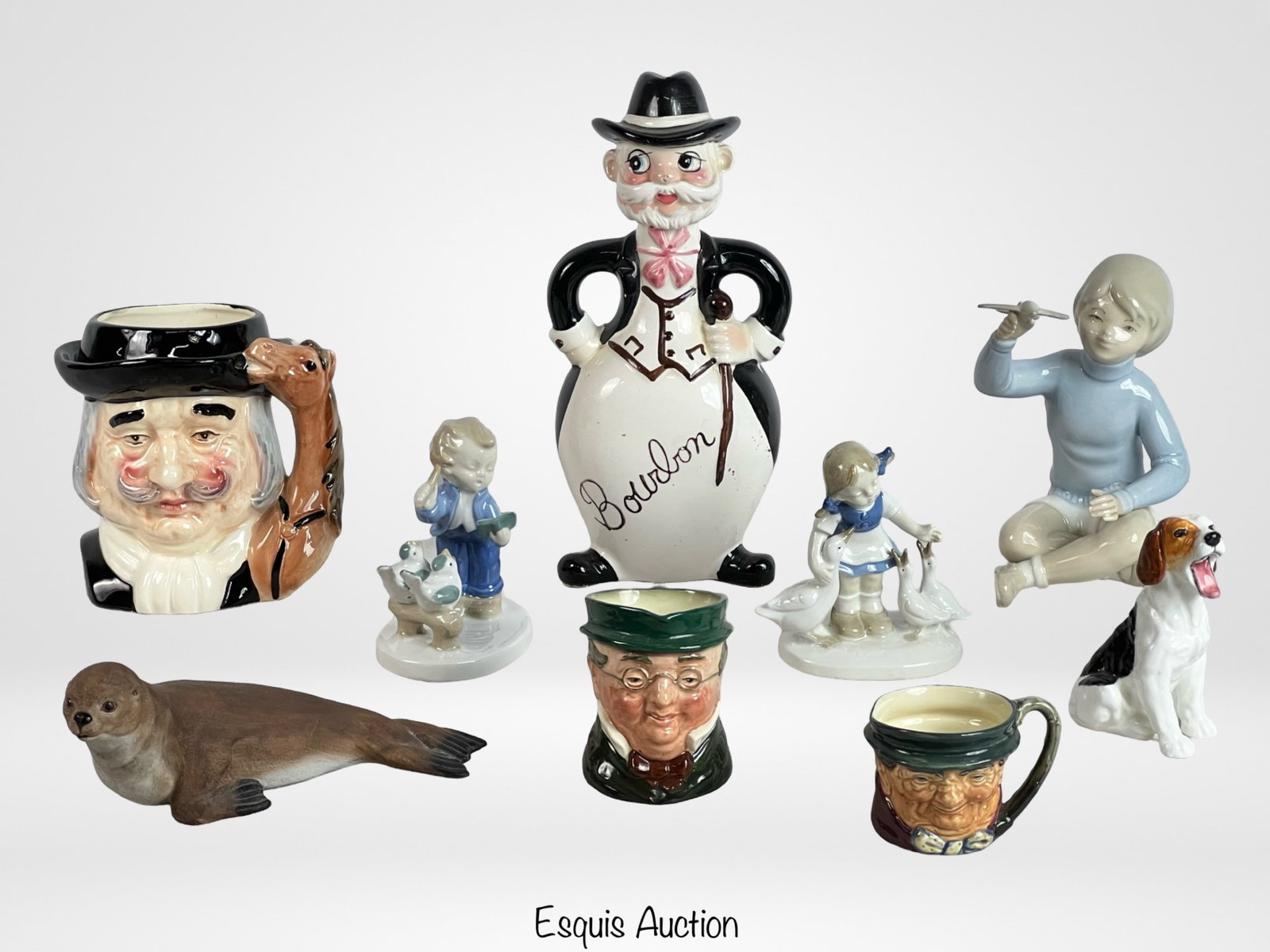 Porcelain Figurines & Toby Jus- Royal Doulton & Ge: Group of Porcelain Figurines and Toby Jugs including Royal Doulton and German. Tallest is 10" All are in good overall condition.