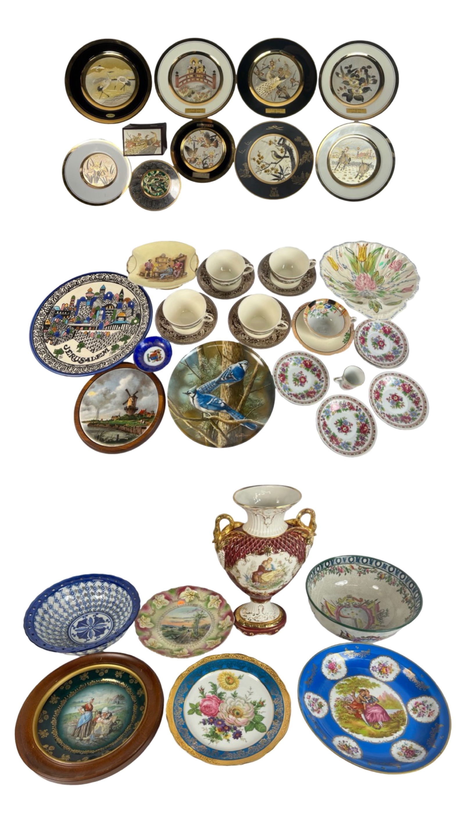 Group of Assorted Decorative Plates, Cups, Bowls: Japanese Themed Plates: A set of finely crafted plates with traditional Japanese motifs such as cranes, bridge scenes, and floral arrangements, showcasing intricate gold accents on black or white back
