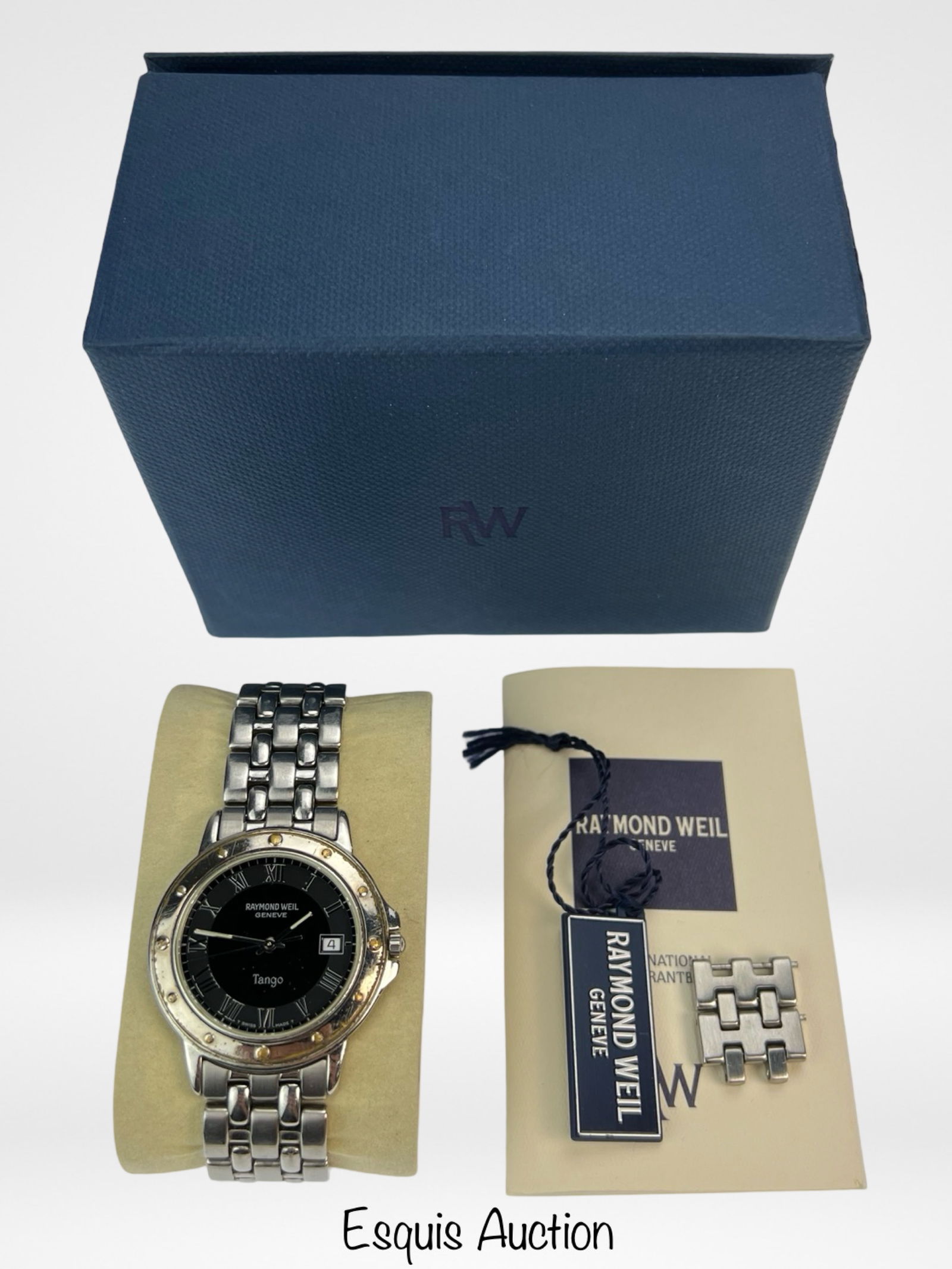Raymond Weil Tango 5560 Wrist Watch: Raymond Weil Tango 5560 Wrist Watch. Working Condition, shows some wear, comes with original box.