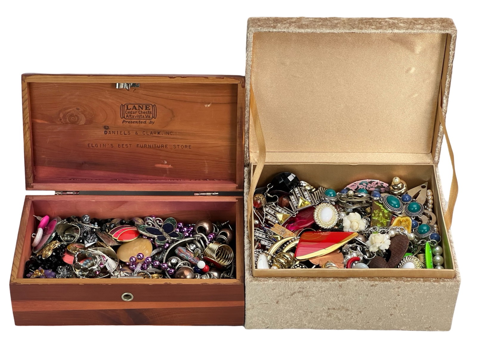 2 Boxes of Unsearched Costume Jewelry: An exciting lot of two boxes brimming with a mix of unsearched costume jewelry. This collection may include an array of necklaces, bracelets, earrings, brooches, and other accessories. Perfect for res