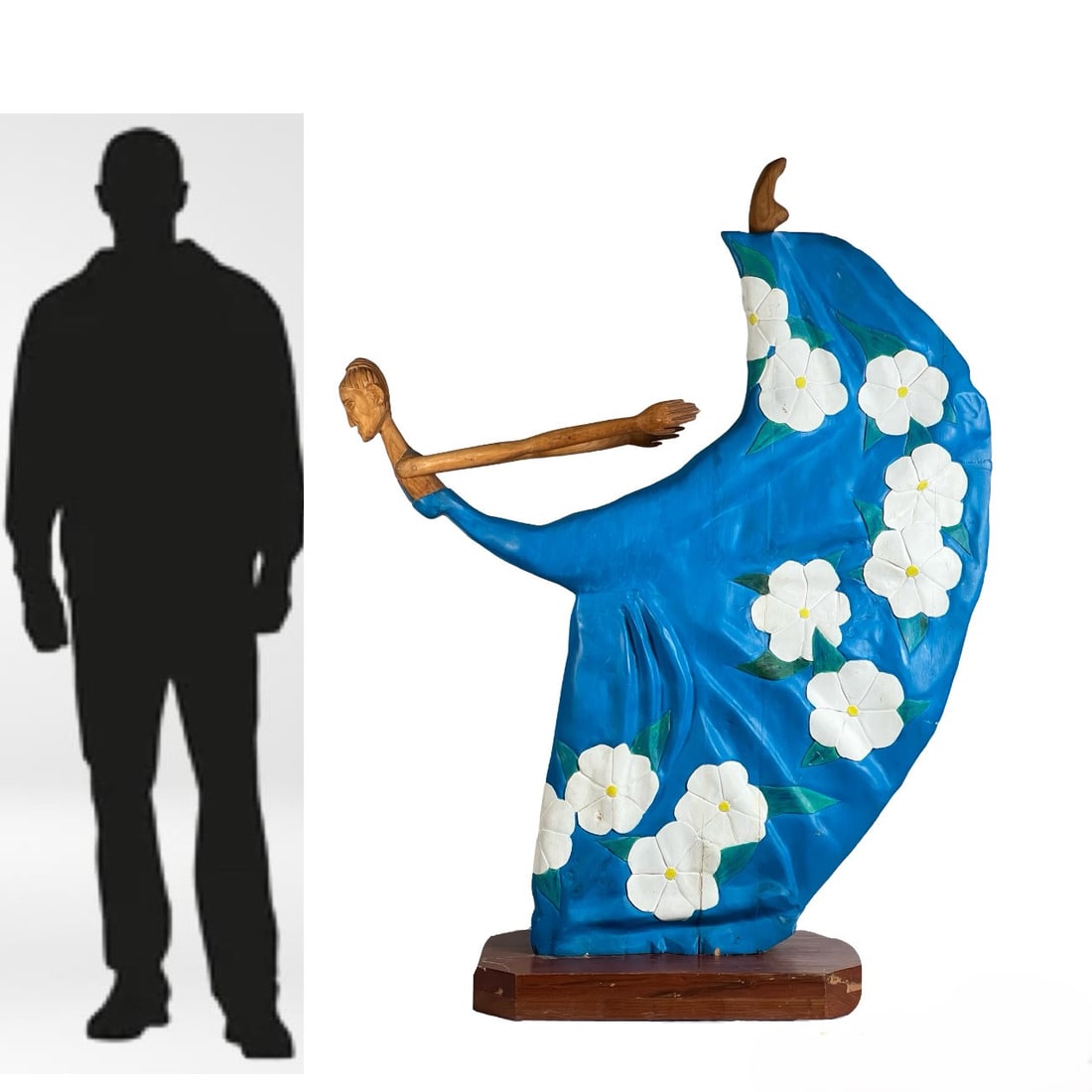 Life-Size Large Wood Carved Lady Dancer Sculpture: This striking hand-carved wood sculpture features a dynamic dancer, standing 60" tall and 26" wide. The artist has captured a fluid sense of movement, with the figure's long arms outstretched and a sw