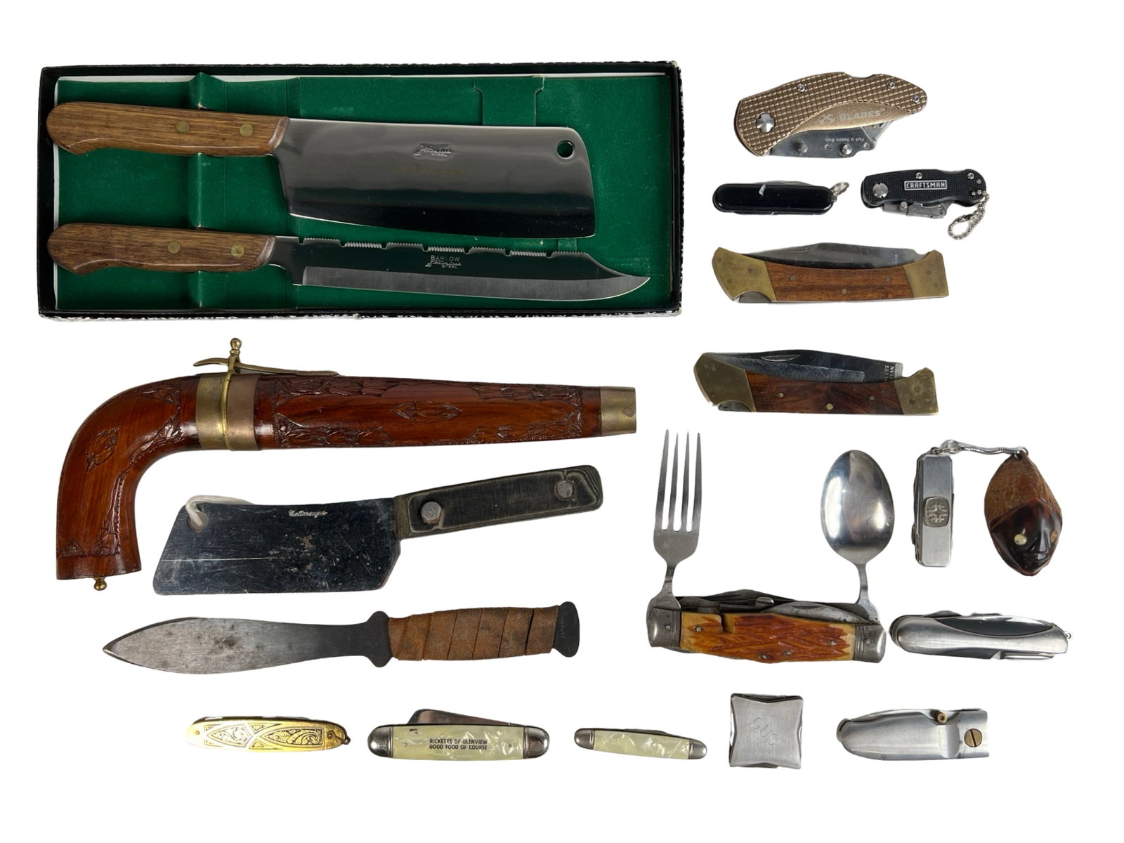Assorted Knife & Multi-Tool Lot: This collection includes an array of utility knives, multi-tools, and hunting knives. Highlights include a set of two Ginsu brand knives with wooden handles in their original packaging, a wooden-handl