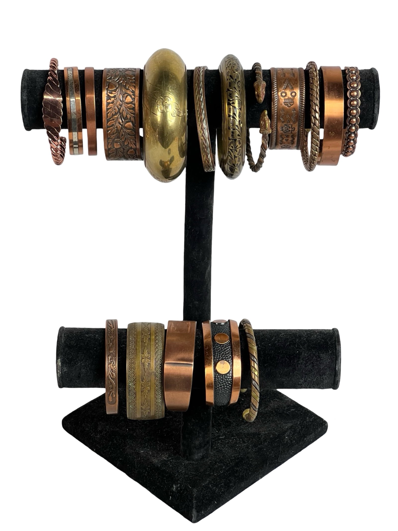Copper & Brass Lady's Bracelets: Explore a diverse assortment of mostly copper or brass bracelets, each one offering its own unique style and charm.