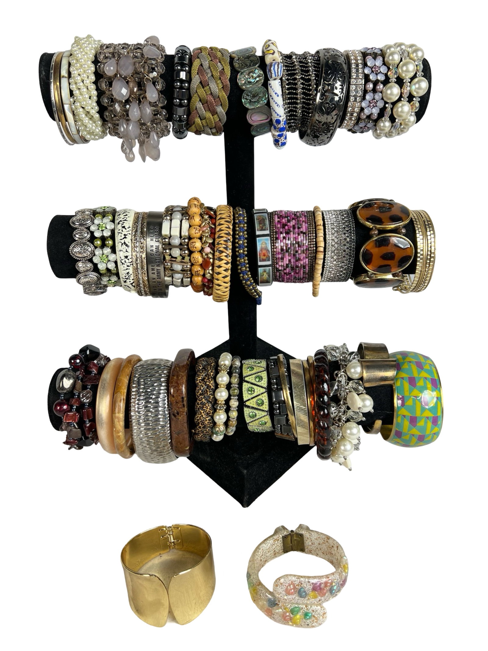 Collection of Lady's Bracelets: Explore a diverse assortment of bracelets, each one offering its own unique style and charm. Display stands are not included.