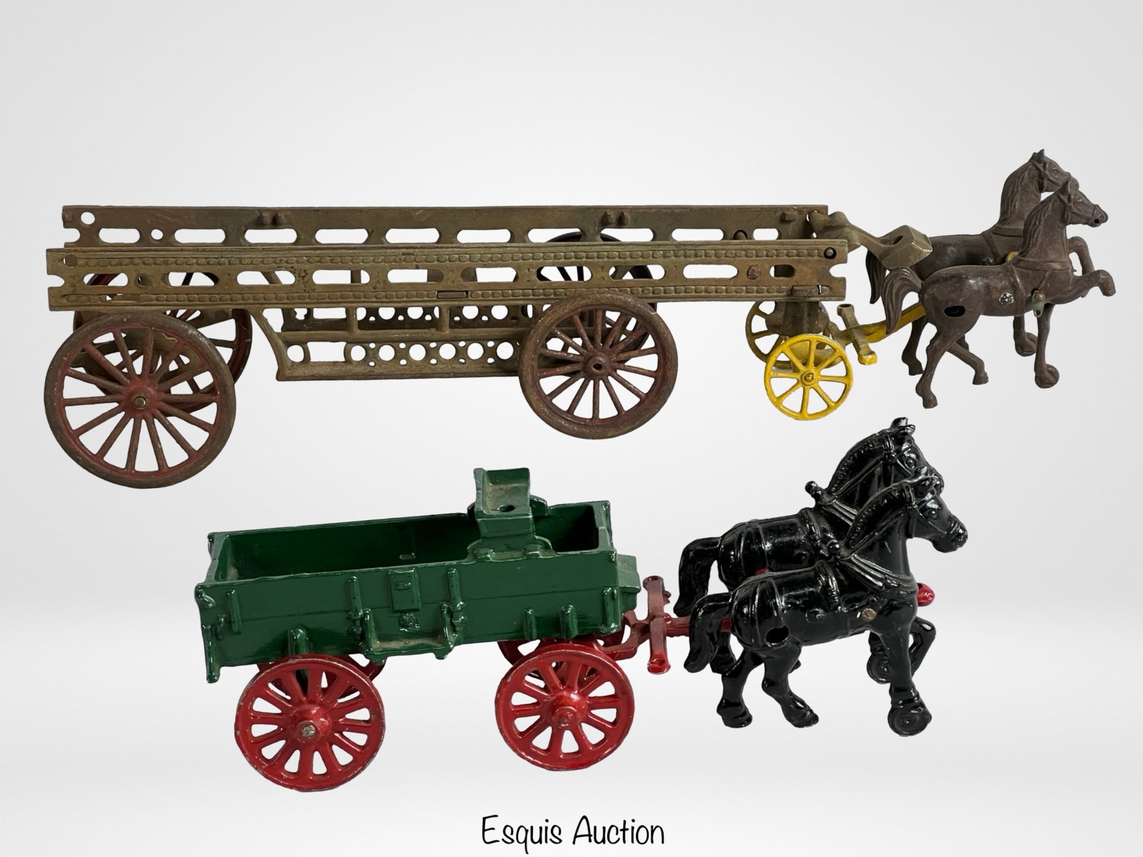 Vintage Cast Iron Horse Drawn Wagons: Vintage Cast Iron Horse Drawn Wagons. Both marked "Made in USA". 20" x 4 1/2" x 4" & 11" x 3 1/2" x 4".