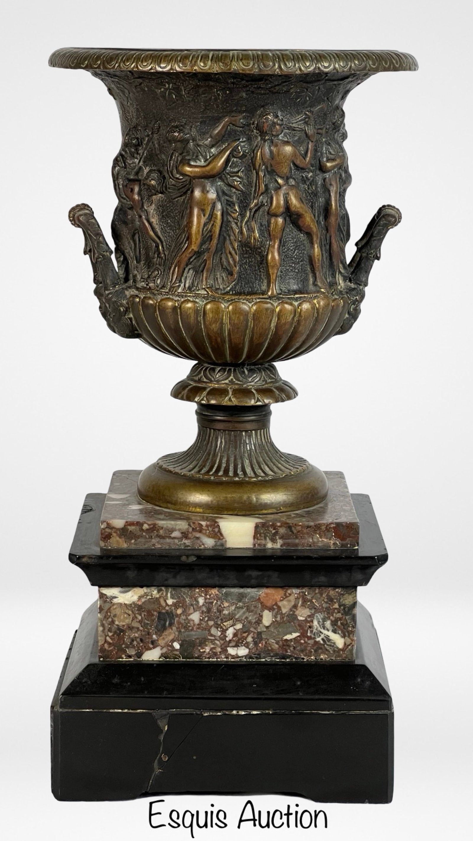 Antique 19th C Bronze "Medici" Urn w Bacchanalian: This bronze urn is a 19th-century reproduction of the famous Medici Vase, which was a classical piece from ancient Rome that became renowned for its intricate relief depicting Bacchanalian scenes. The