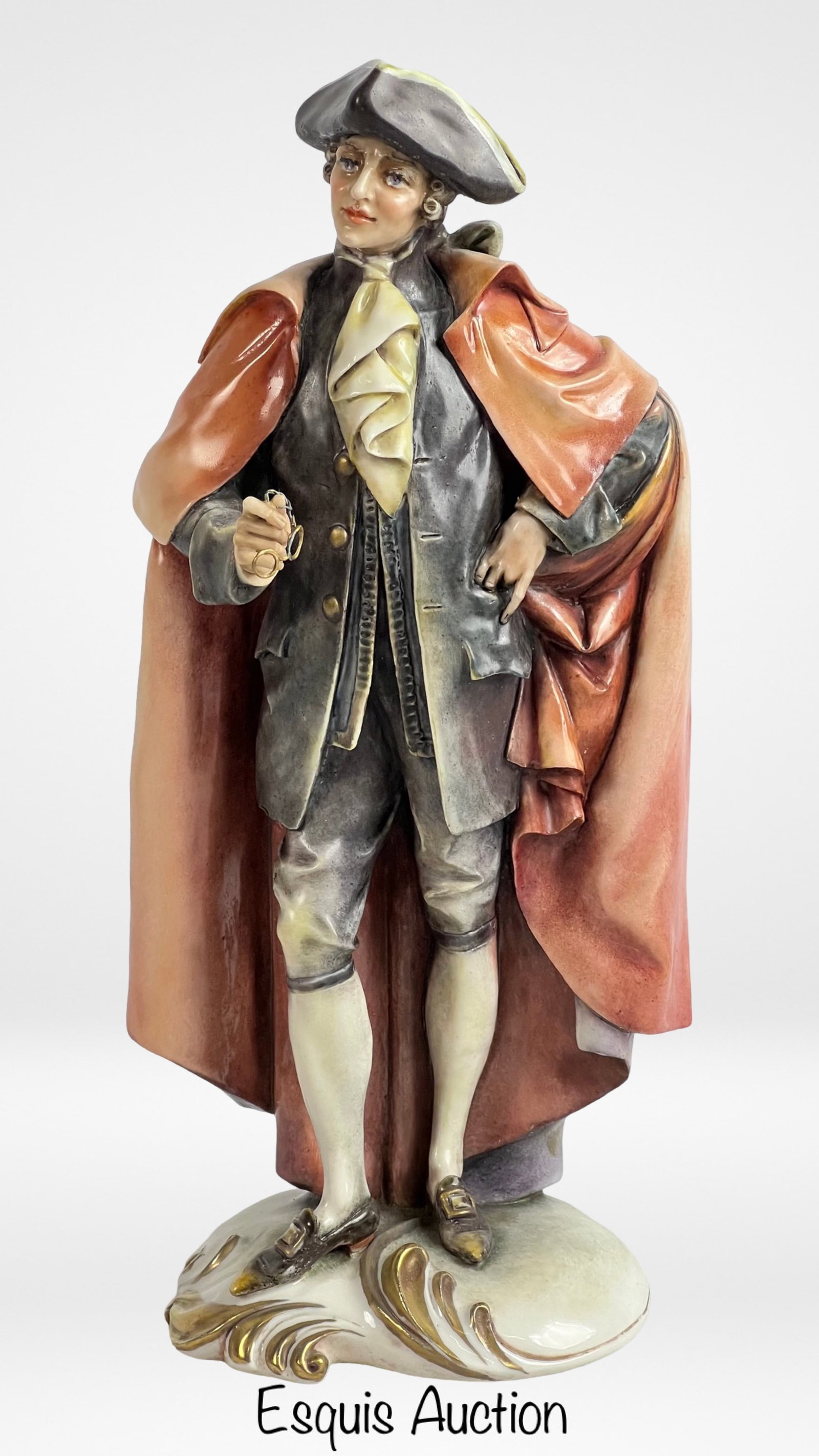 Antonio Borsato "The Aristocrat" Figurine: This elegant figurine, sculpted by the renowned Italian artist Antonio Borsato, captures a poised and dapper aristocrat from a bygone era. The figure exudes charm and sophistication, adorned in detail