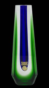 Egermann Czech Crystal Glass Vase by Pavel Hlava: This striking crystal glass vase, designed by renowned Czech glass artist Pavel Hlava, was produced for Egermann in the 1960s. It features a unique geometric design with vertical bands of green and de