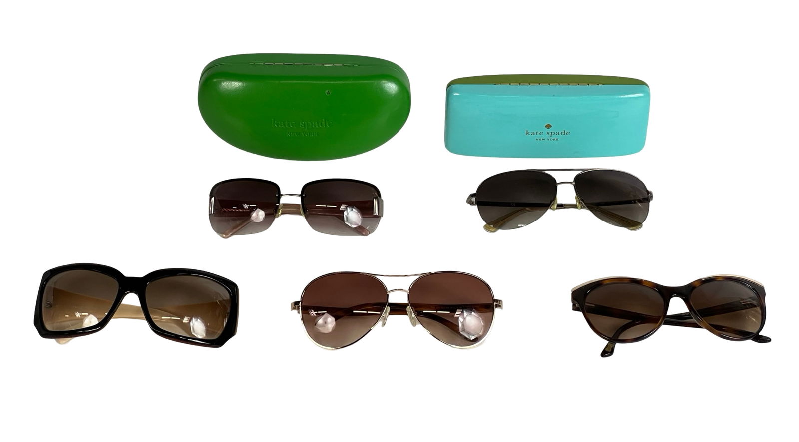 Ladys Designer Prescription Sunglasses/ Eyeglasses: This lot includes five pairs of women's designer prescription sunglasses eyeglasses including Versace, Kate Spade, Ted Baker. Normal wear, some might have minor scuffs and scratches.
