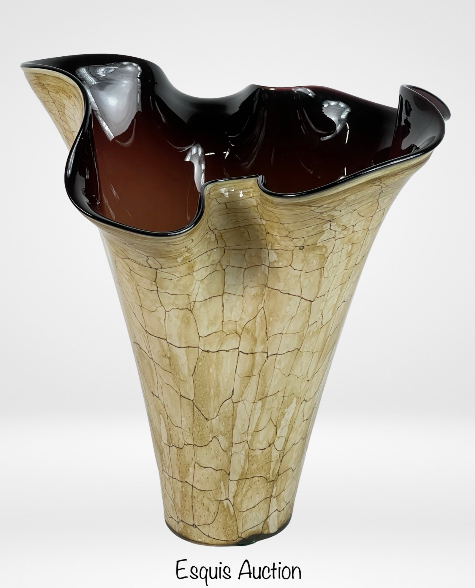 Jozefina Krosno Brown Handkerchief Art Glass Vase Live Webcast Auction: This stunning art glass vase by Jozefina Krosno is a remarkable example of Polish glass artistry. Standing at 13 inches tall and 11 inches wide, this piece features a distinctive handkerchief-style ri