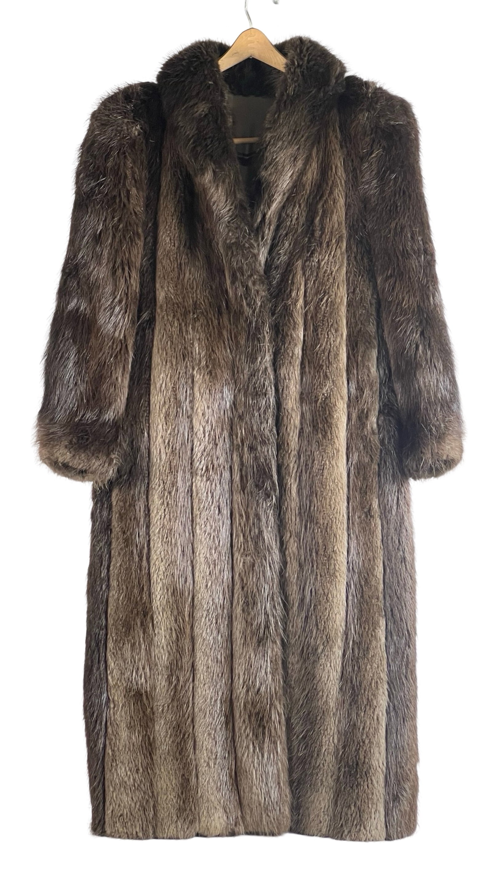 Genuine Lady's Beaver Fur Coat by Wolfie: This luxurious genuine beaver fur coat, designed by Wolfie, exudes timeless elegance. Measuring approximately 47" in length, it falls beautifully around knee-length, ideal for added warmth and style. 