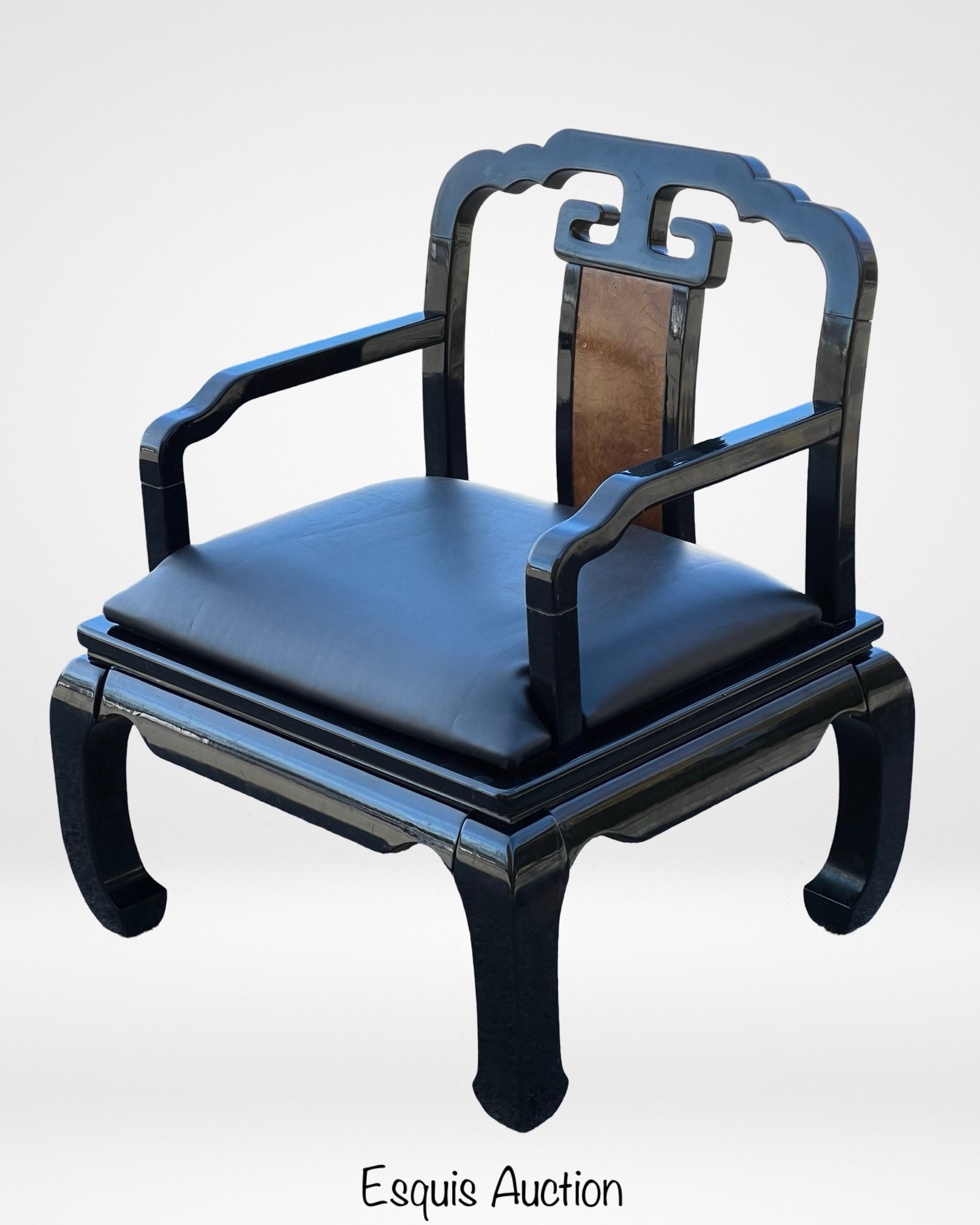 Chinese Ming Dynasty Style Lacquered Arm Chair: This elegant armchair is crafted in the classic Ming Dynasty style, embodying traditional Chinese aesthetics with a sleek, lacquered black finish. Measuring 33" in height, 27" in width, and 25" in dep