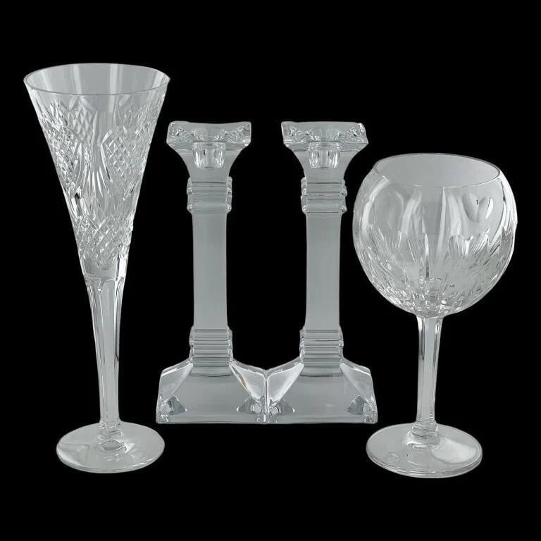 Waterford Crystal Glasses & Column Candlesticks: Elevate your dining and entertaining experience with this exquisite Waterford Collection, featuring a Crystal Champagne Flute, Wine Glass, and a pair of Marquis by Waterford Column Candlesticks. The t