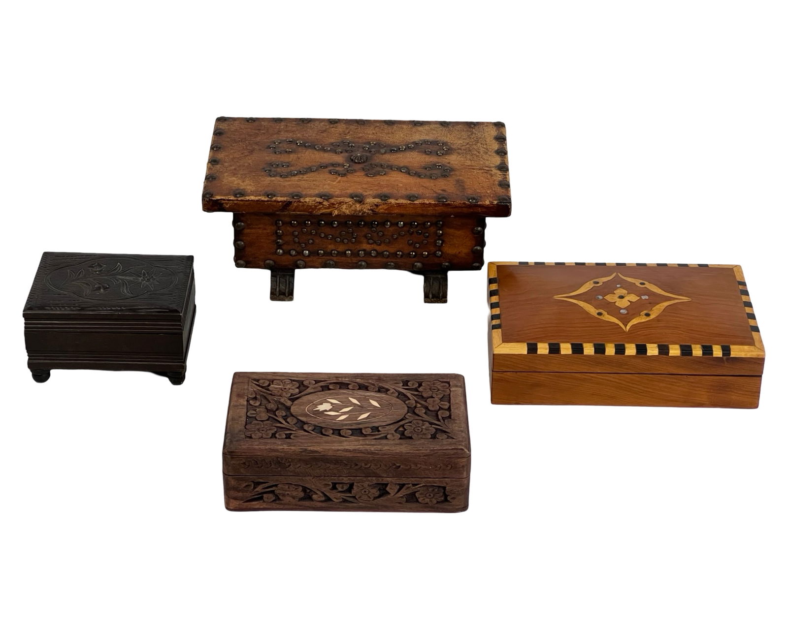 Vintage Handcrafted Wooden Decorative Boxes: A charming assortment of four vintage wooden boxes, each showcasing unique craftsmanship and design. Largest is 8" x 5"x 2".