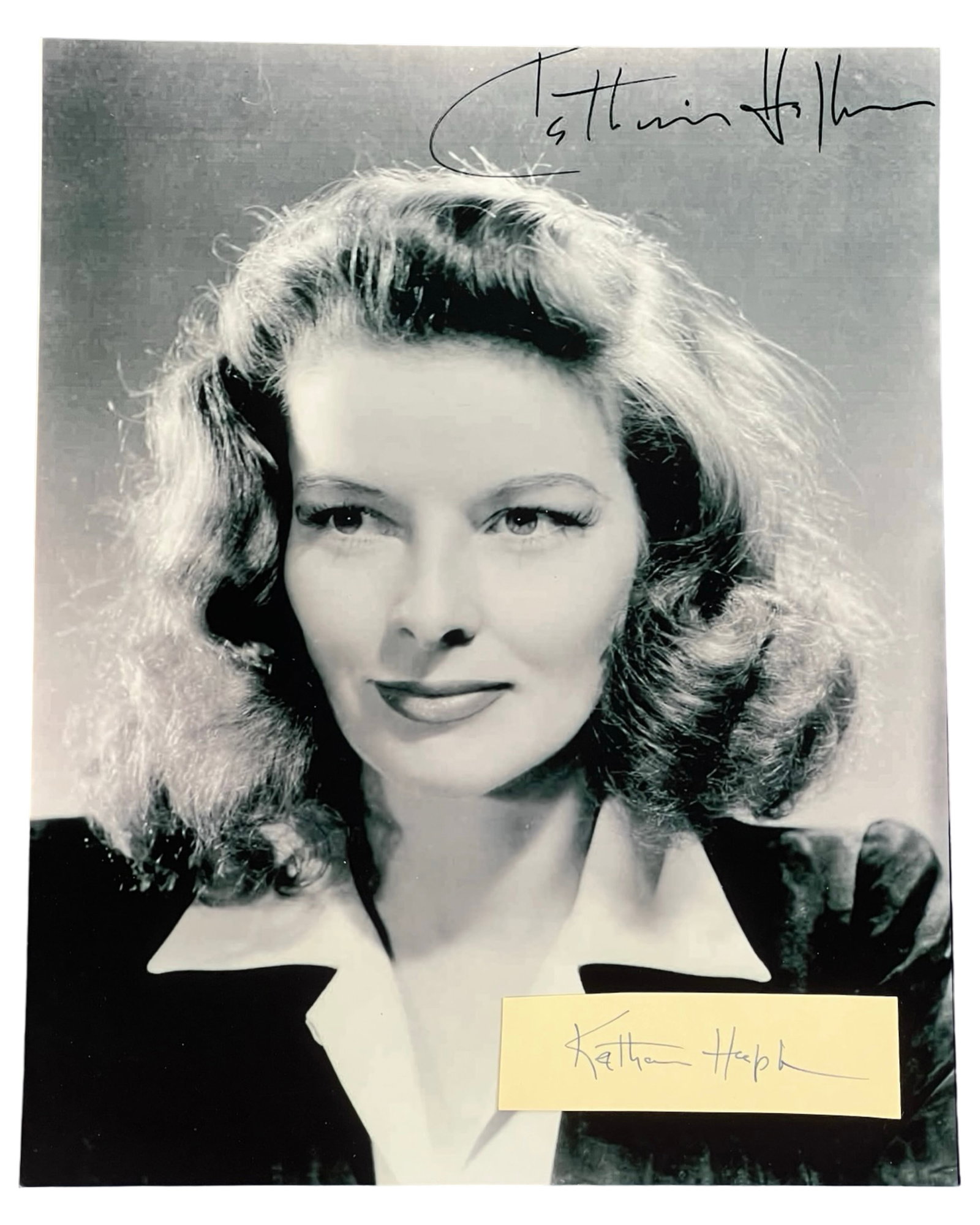 Katherine Hepburn Autograph with Photo: Presenting a remarkable piece of Hollywood history, the Katherine Hepburn Autograph Signature Cut paired with an 8" x 10" Reprint Photograph. This collection captures the elegance and grace of one of 