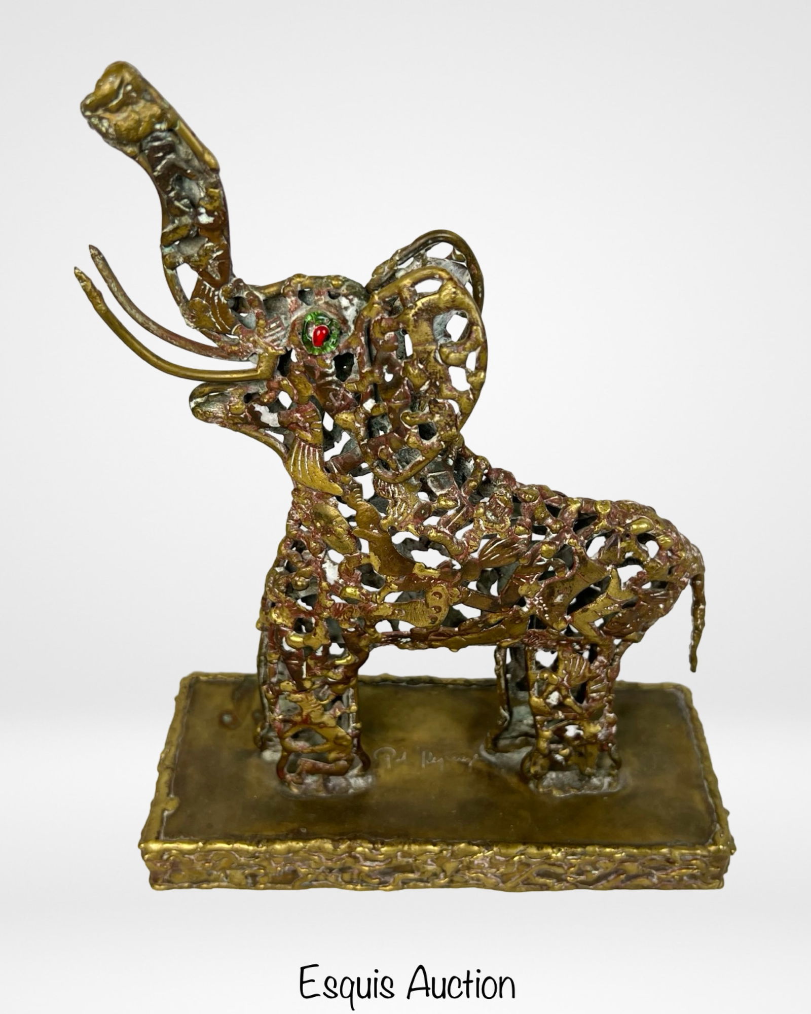 Pal Kepenyes Milagros Elephant Sculpture: Unique brass and bronze elephant sculpture by Hungarian-Mexican artist Pal Kepenyes, constructed from an intricate assembly of milagros-small symbolic charms used for protection, health, and good fort