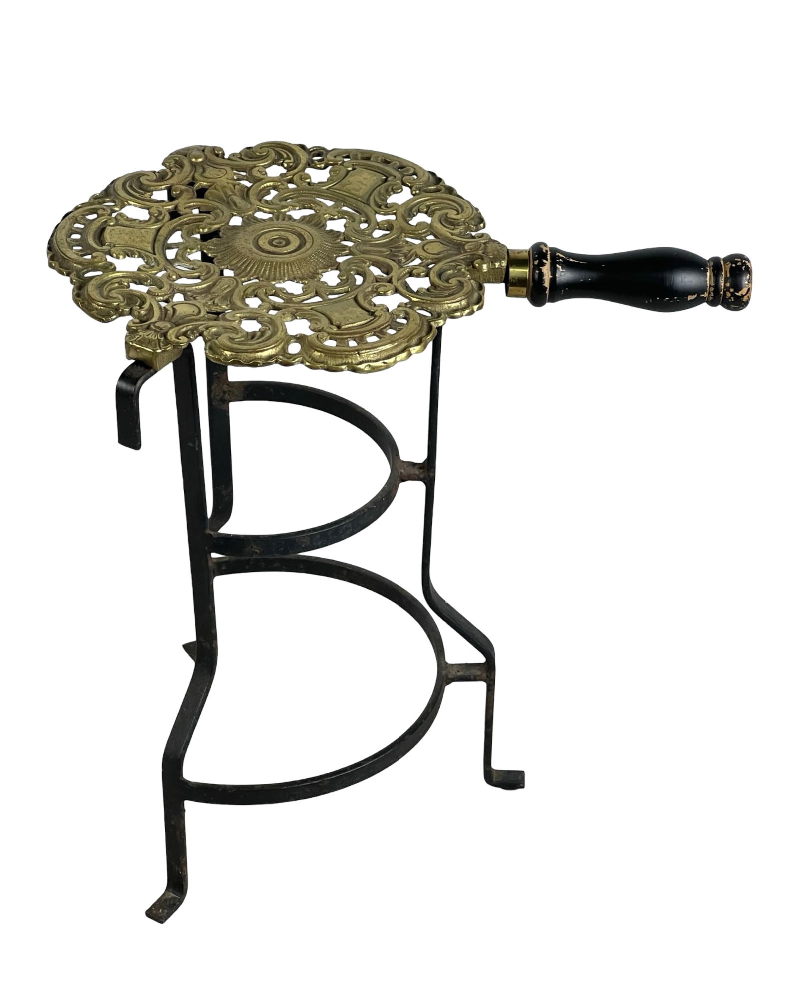 Vintage Cast Brass Fireplace Trivet by Glo-Mar: A beautifully crafted vintage cast brass trivet designed by Glo-Mar Artworks Inc. This ornate piece features an intricate filigree design with a sunburst motif at the center, adding elegance and funct