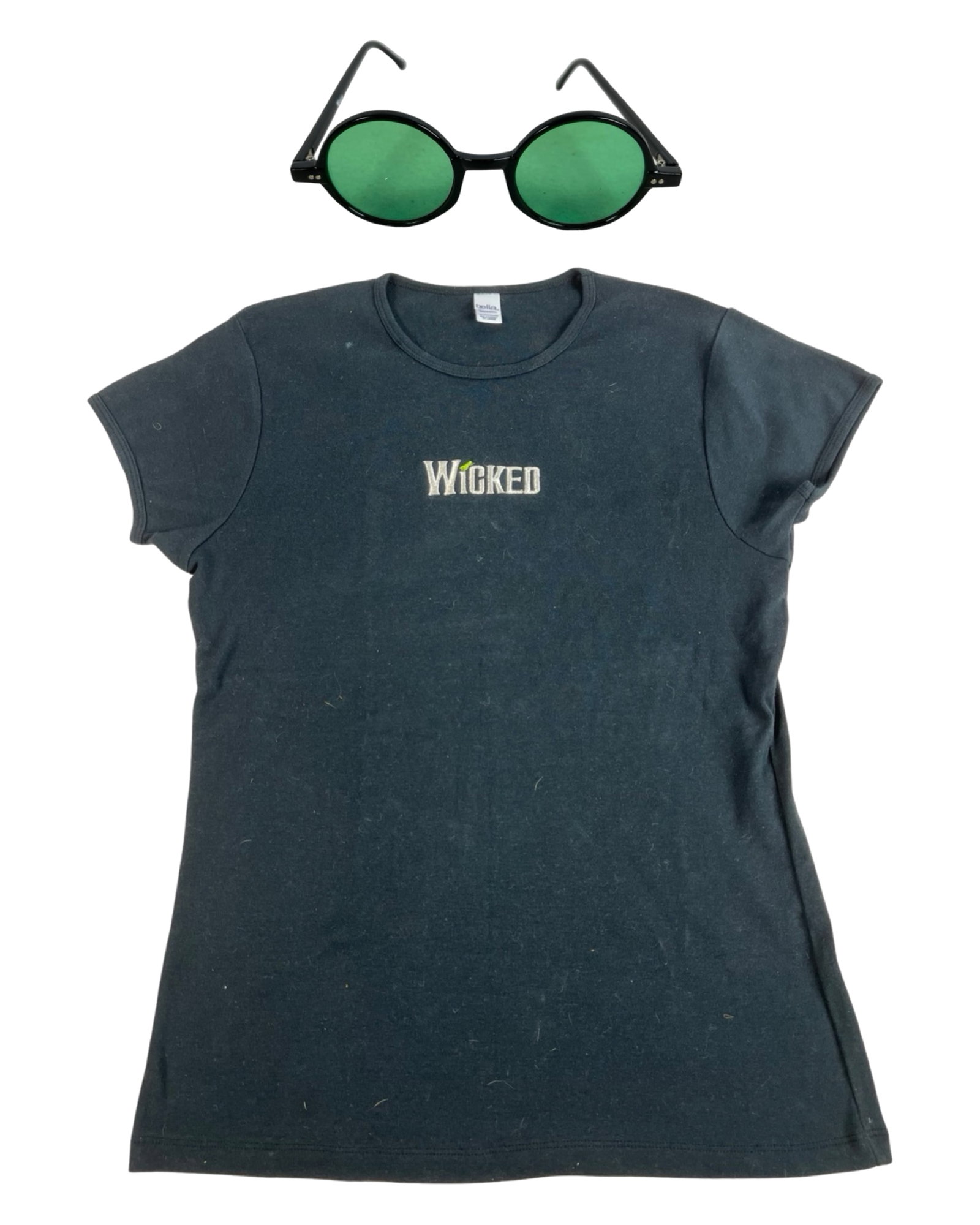 "Wicked" Promo T-Shirt and Green Glasses Set: Celebrate the magic of Broadway with this "Wicked" musical set, featuring a black Bella t-shirt embroidered with the iconic "Wicked" logo (XXL) and a pair of round green glasses inspired by the Emeral