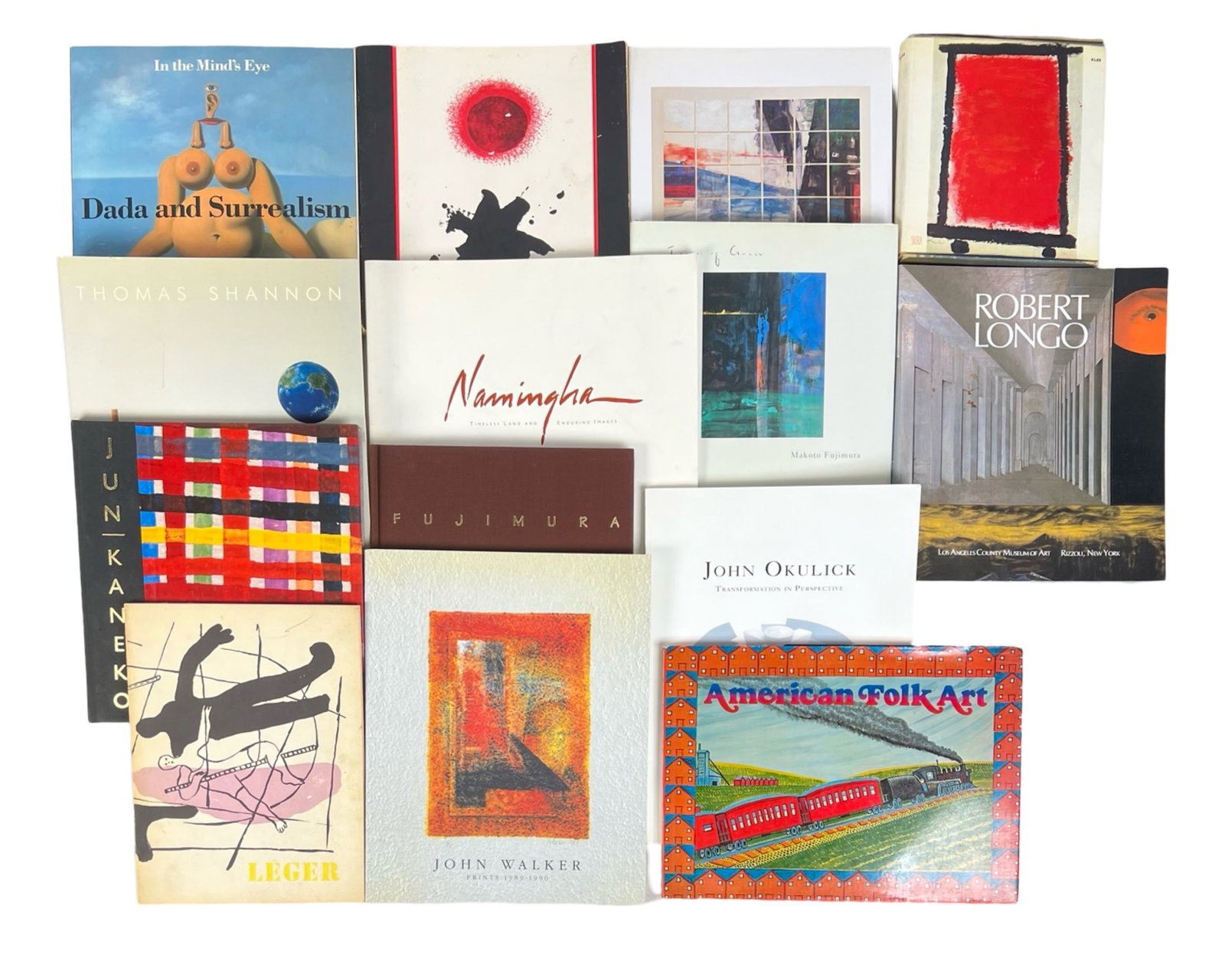 Lot of Art Books- Surrealism, Folk Art & Contempor: This diverse collection includes books on a range of artistic movements and renowned artists. Titles such as In the Mind's Eye: Dada and Surrealism, American Folk Art, and Leger showcase various artis