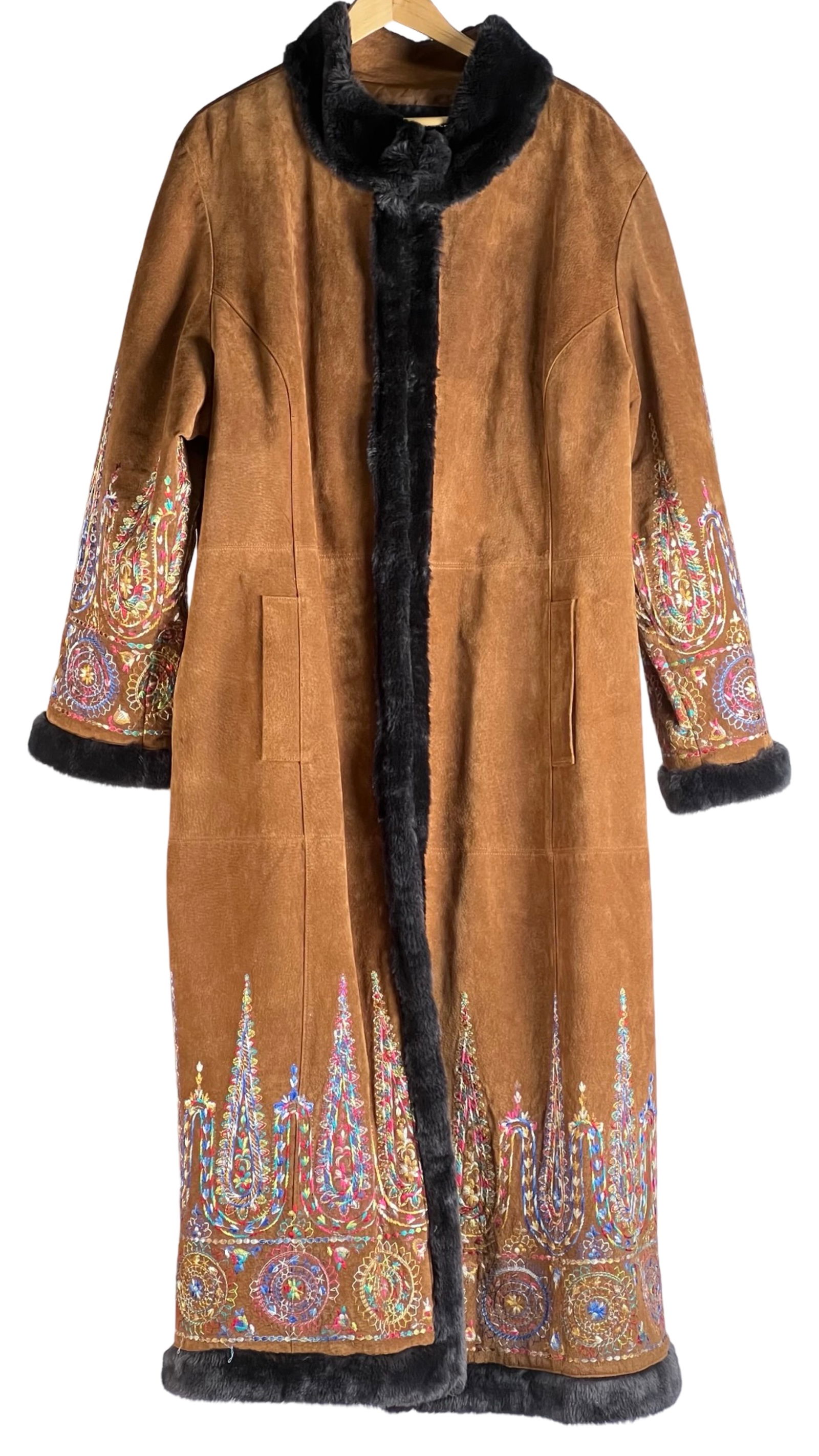 Margaret Godfrey Penny Lane Suede Embroidered Coat: Stunning Margaret Godfrey Penny Lane coat crafted from luxurious brown suede, featuring vibrant paisley embroidery and faux fur trim along the cuffs, collar, and edges. This longline coat measures 51"