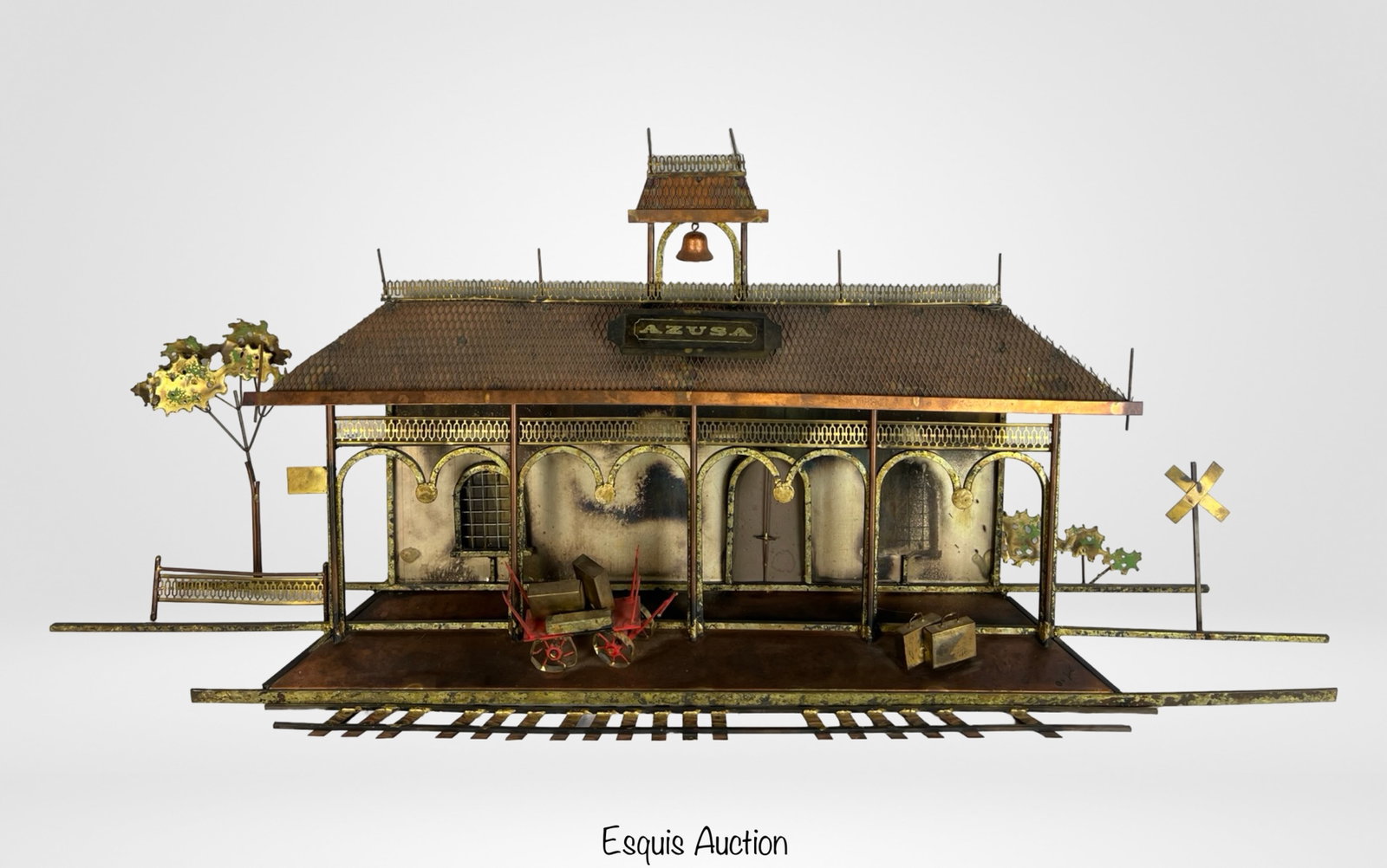 Curtis Jere Metal Azusa Train Station Sculpture: This striking Curtis Jere wall sculpture captures the essence of a vintage railroad train station, titled "Azusa." Meticulously crafted in a Brutalist style, the piece features detailed arches, a bell