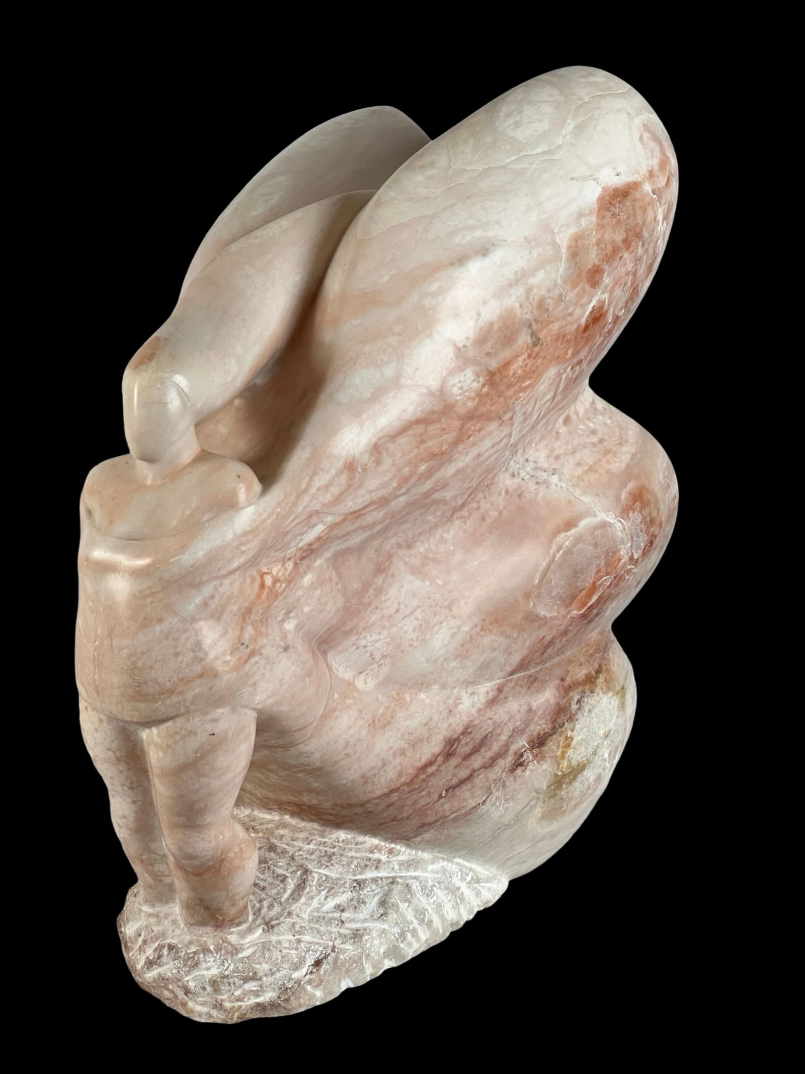 Kay Hoffman Modernist Butterfly Nude Sculpture: Striking modernist sculpture by Kay Hoffman depicting a nude lady with butterfly-inspired wings. Crafted from a massive single piece of stone, this piece exhibits flowing lines and a delicate balance